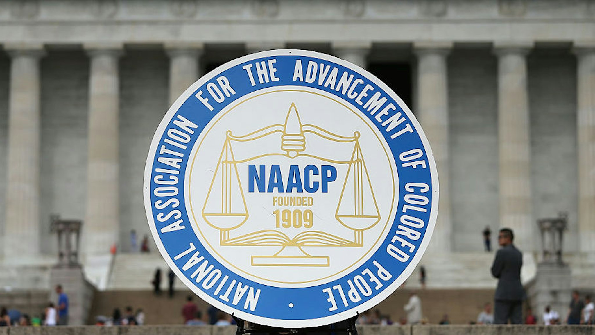 A logo is seen for the National Association for the Advancement of Colored People as NAACP President and CEO Cornell William Brooks speaks during a press conference at the Lincoln Memorial June 15, 2015 in Washington, DC.