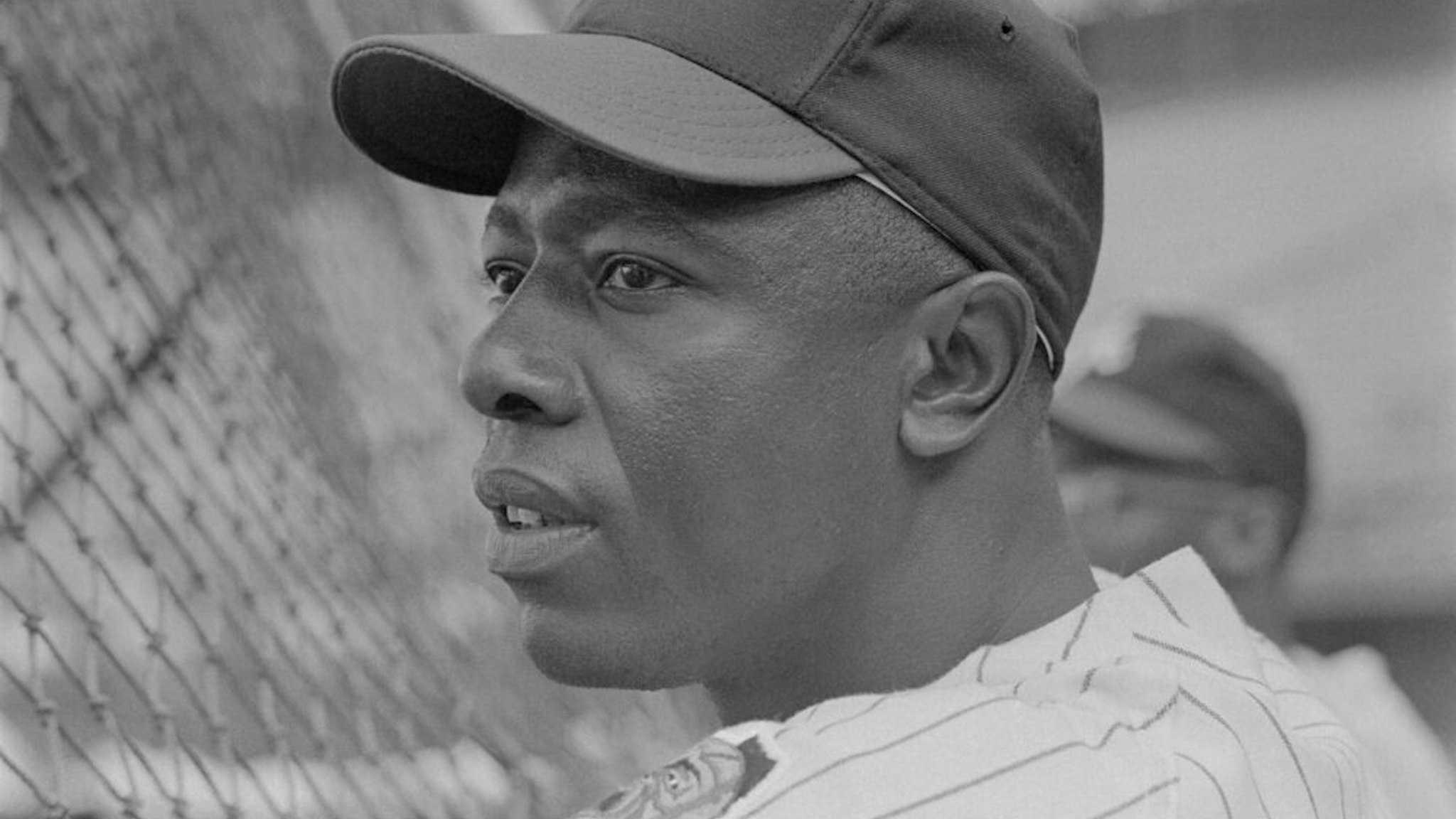 Hank Aaron, the right fielder for the Atlanta Braves, shown in this close up photograph, was named to the National League All Star team for the 16th straight year. It was the 13th time he was named to the starting outfield. Aaron is the only repeater picked. Hank is shown in the batting cage before the start of the Braves-Phils game in Atlanta. Aaron has the lowest average of his career at .236 when picked.