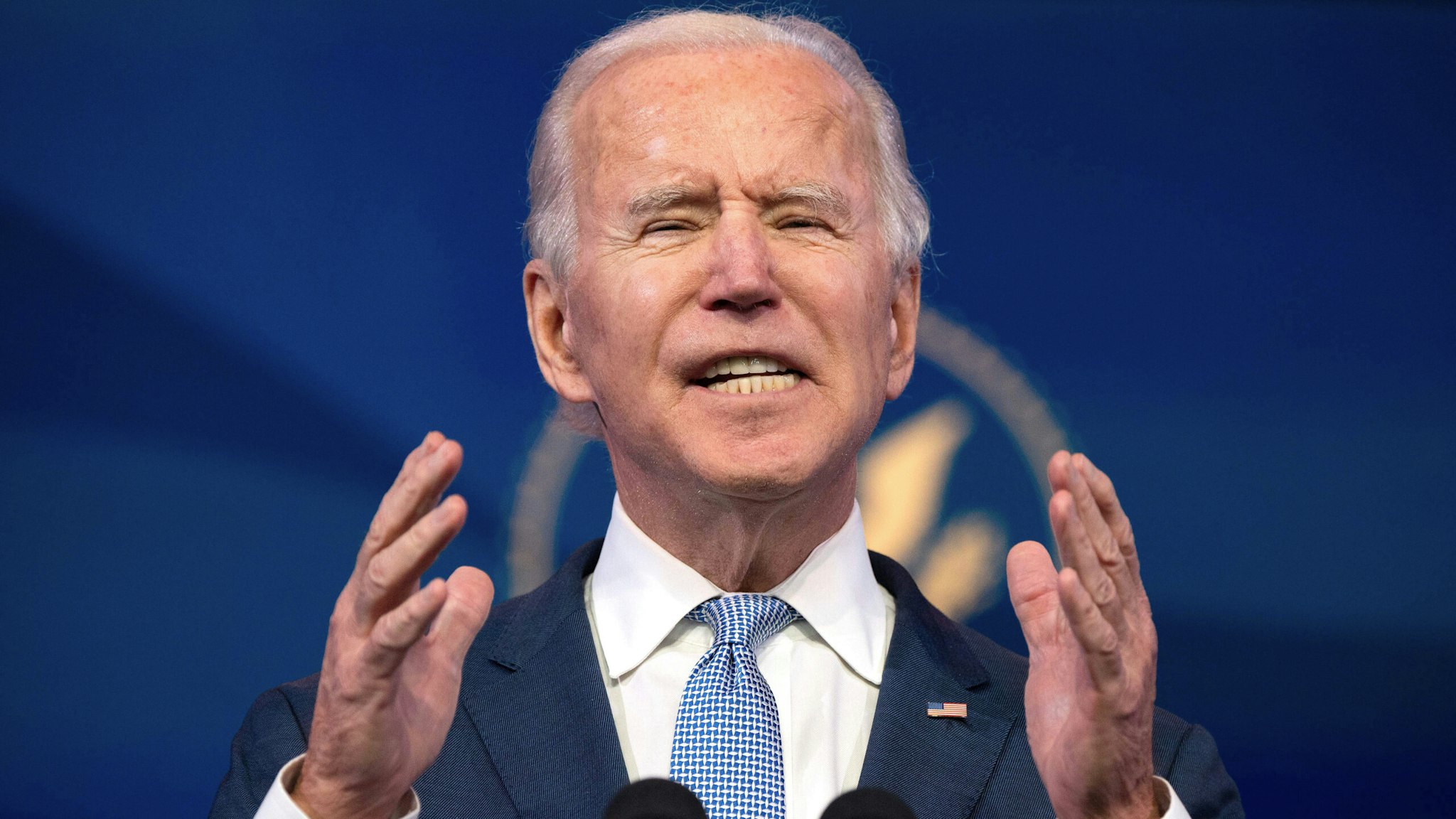 US President-elect Joe Biden speaks at the Queen Theater on January 6, 2021, in Wilmington, Delaware. - Biden on Wednesday denounced the storming of the US Capitol as an "insurrection" and demanded President Donald Trump go on television to call an end to the violent "siege."