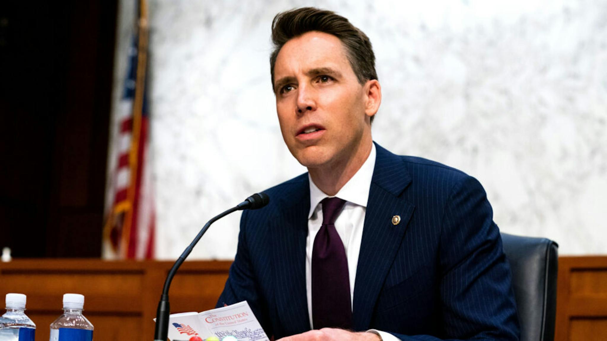 Senate Holds Confirmation Hearing For Amy Coney Barrett To Be Supreme Court Justice WASHINGTON, DC - OCTOBER 13: U.S. Sen. Josh Hawley (R-MO) listens while Supreme Court nominee Judge Amy Coney Barrett testifies before the Senate Judiciary Committee on the second day of her Supreme Court confirmation hearing on Capitol Hill on October 13, 2020 in Washington, DC. Barrett was nominated by President Donald Trump to fill the vacancy left by Justice Ruth Bader Ginsburg who passed away in September.