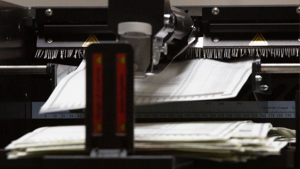 PHOENIX, AZ - OCTOBER 31: Ballots are counted by Maricopa County Elections Department staff ahead of Tuesdays election on October 31, 2020 in Phoenix, Arizona. Early voting lasted from October 7th through the 30th in Arizona, which had a record number of early voters. (Photo by Courtney Pedroza/Getty Images)