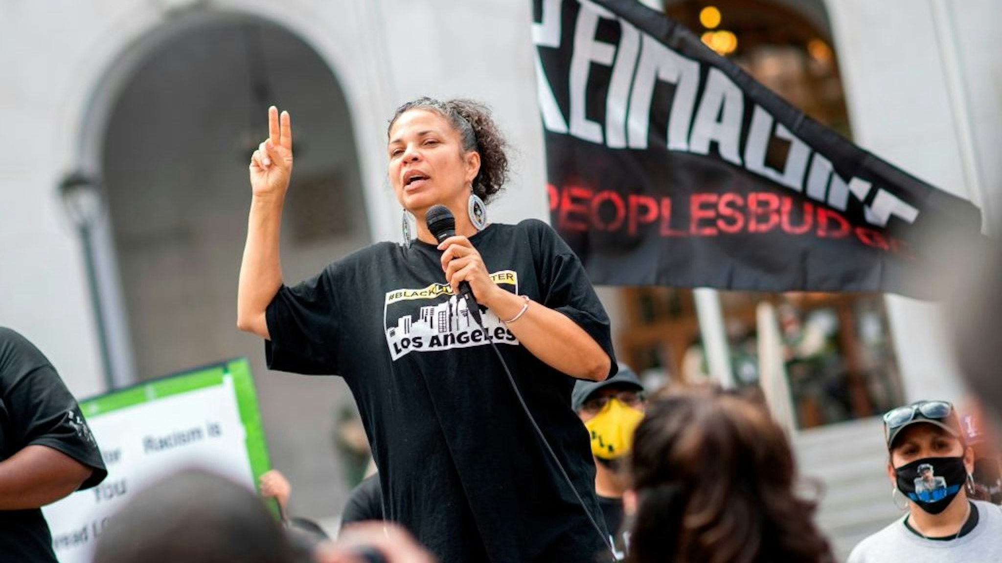 Melina Abdullah from Black Lives Matter addresses the crowd during a demonstration to ask for the removal of District Attorney Jackie Lacey in front of the Hall of Justice, in Los Angeles, California, on June 17, 2020.