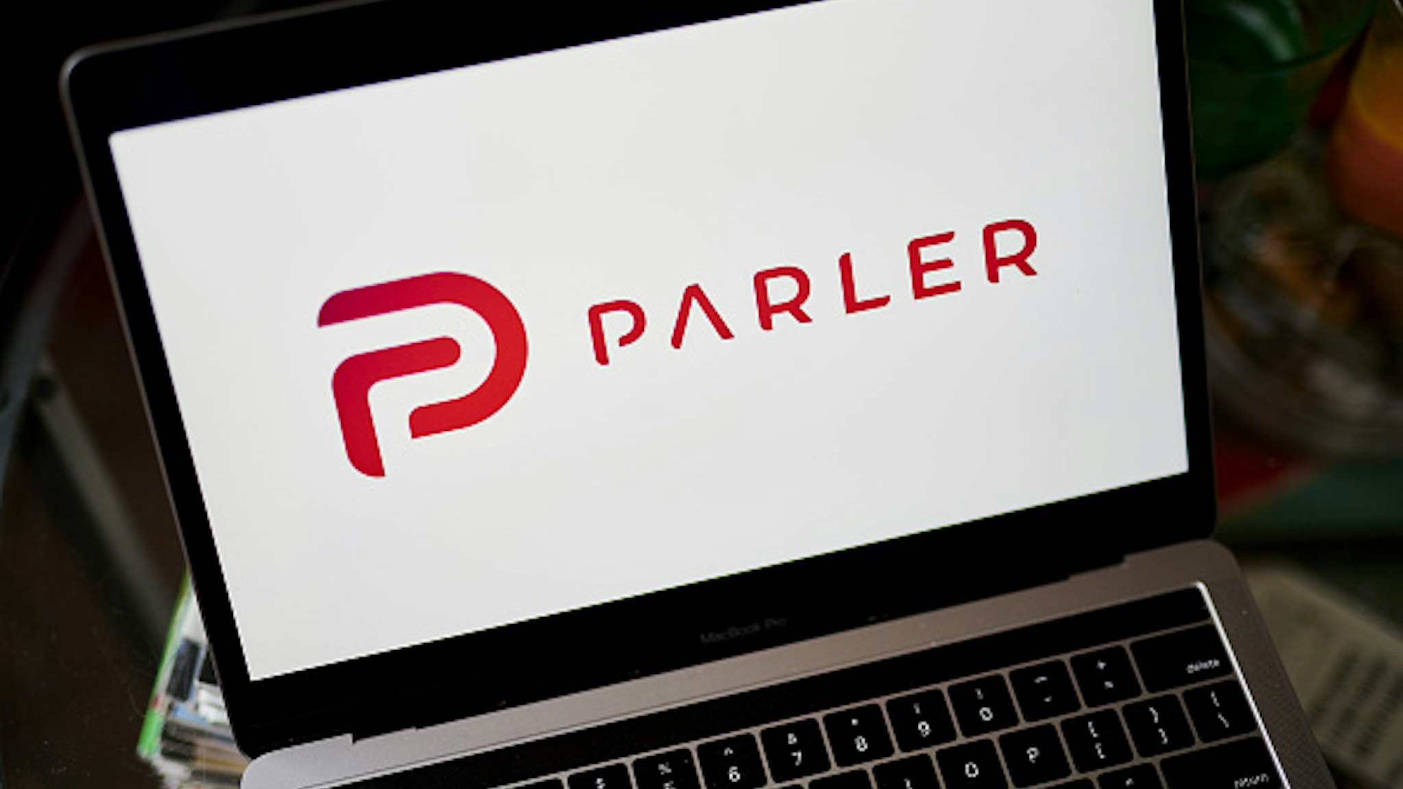 The Parler logo on a laptop computer arranged in the Brooklyn borough of New York, U.S., on Friday, Dec. 18, 2020. Parler bills itself as a non-biased social network that protects free speech and user data. John Matze, chief executive officer, says the platform saw great growth during the 2020 election as many conservatives moved away from products like Facebook and Twitter.