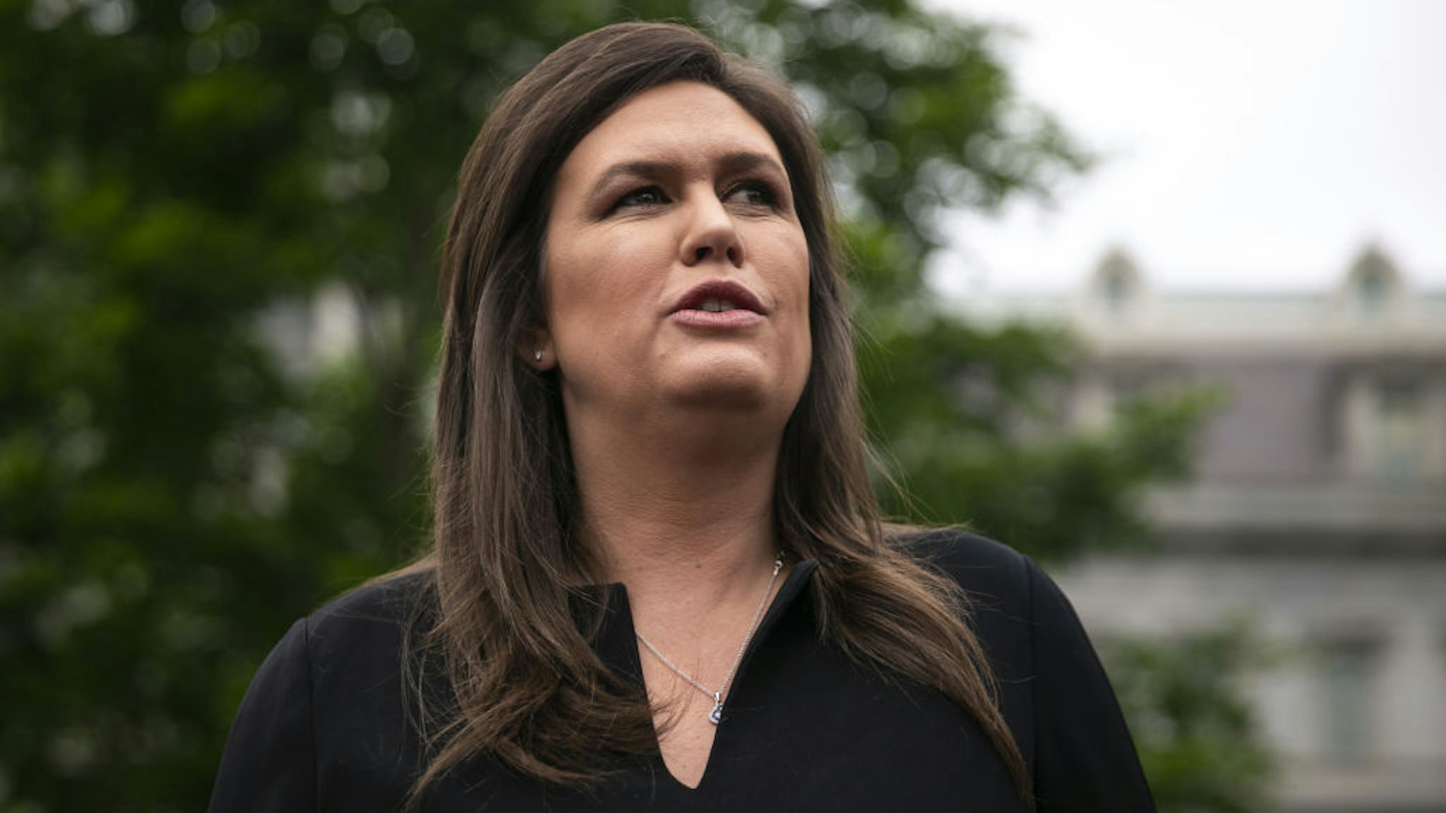 Sarah Huckabee Sanders, White House press secretary, speaks to members of the media outside the White House in Washington, D.C., U.S., on Wednesday, May 8, 2019. The Department of Health and Human Services finalized a rule Wednesday that would require drugmakers to disclose a drug's cost if its price before rebates and discounts is above $35 for a month's supply or the usual course of therapy.