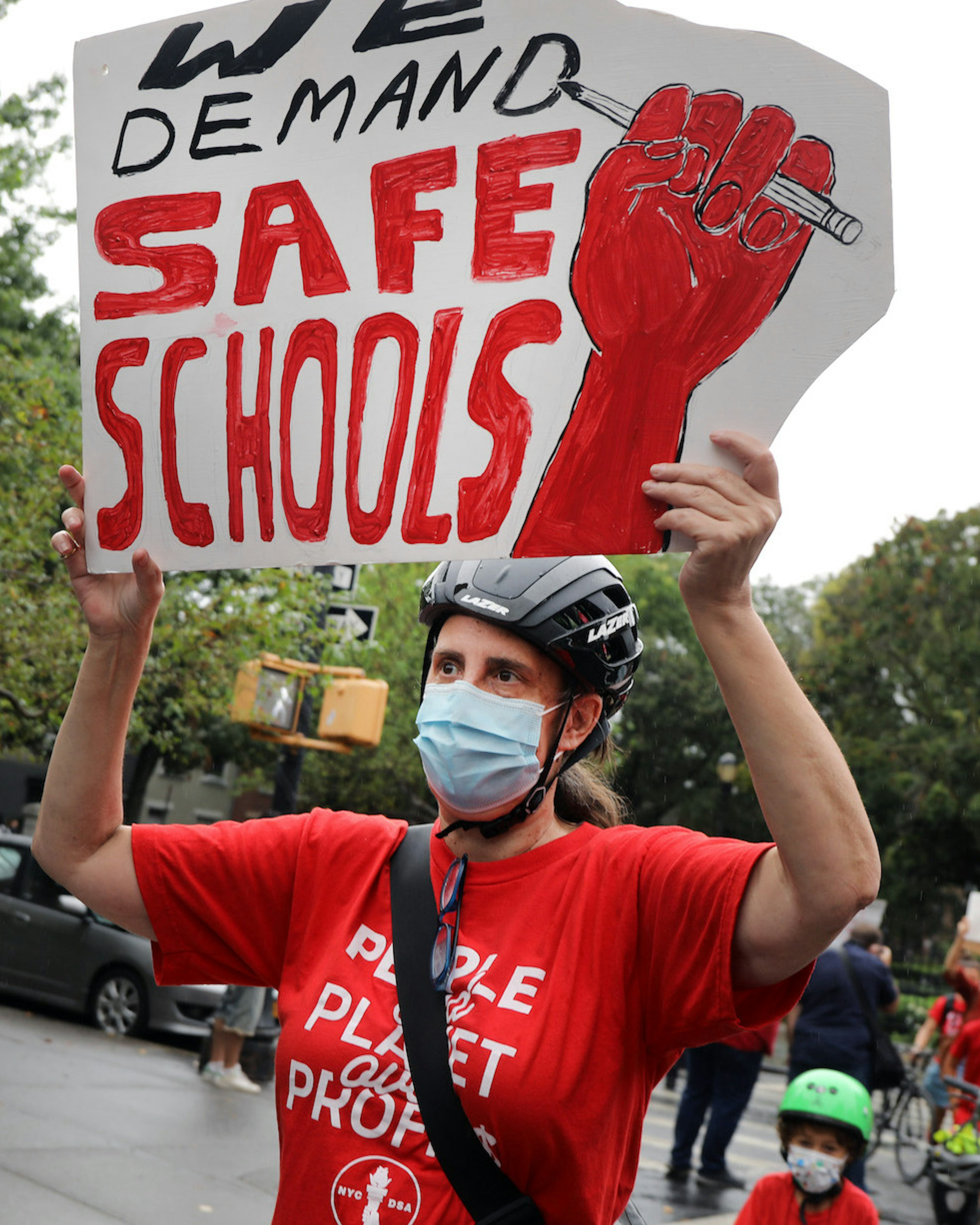 Members of the teachers union, parents and students participate in a march through Brooklyn to demand a safer teaching environment for themselves and for students during the Covid-19 pandemic on September 1, 2020 in New York City. As confusion about the start of the school year continues, New York City Mayor Bill de Blasio announced on Tuesday that the start of the school year will be delayed amid the threat of a teacher strike. (Photo by Spencer Platt/Getty Images)