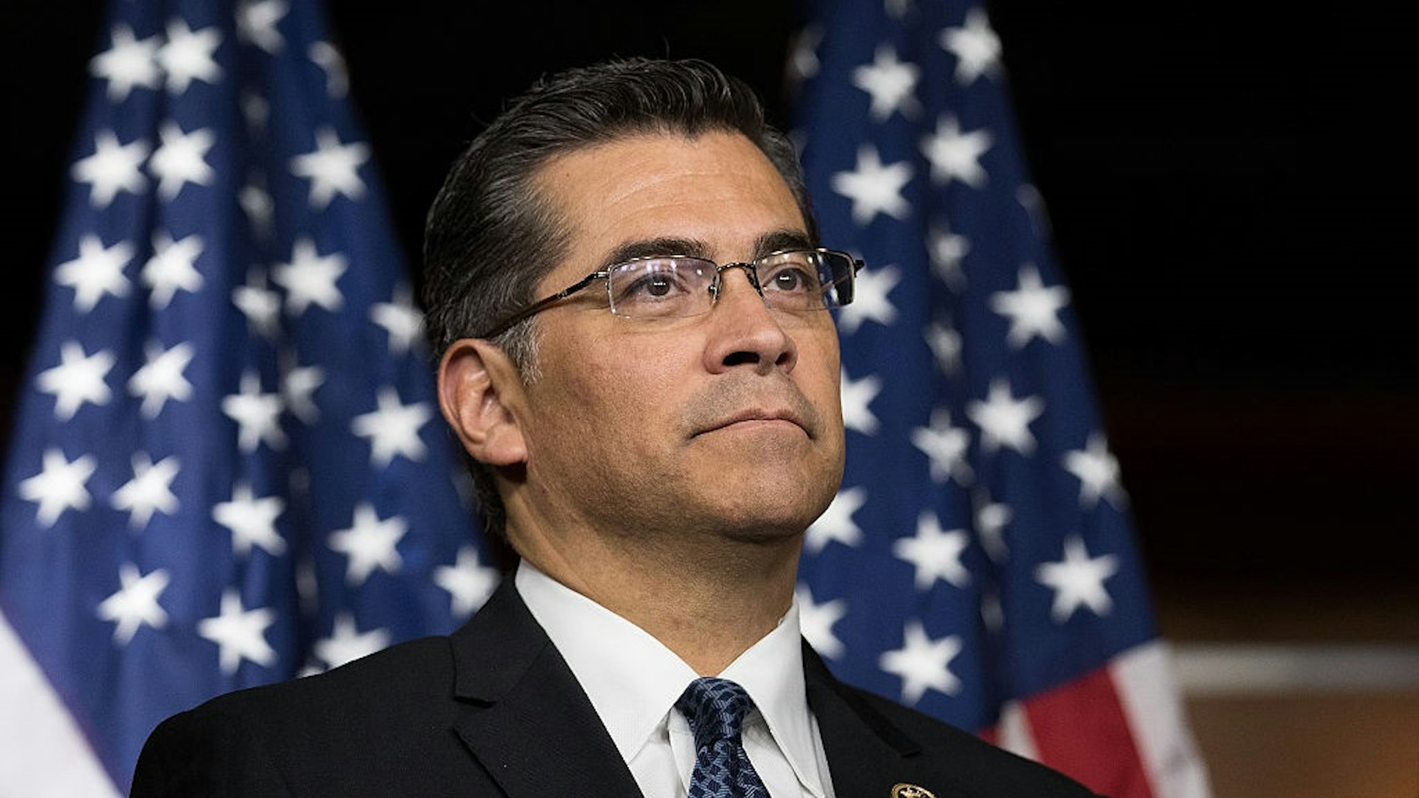 WASHINGTON, DC - MAY 11: Rep. Xavier Becerra (D-CA) listens during a news conference to discuss the rhetoric of presidential candidate Donald Trump, at the U.S. Capitol, May 11, 2016, in Washington, DC.