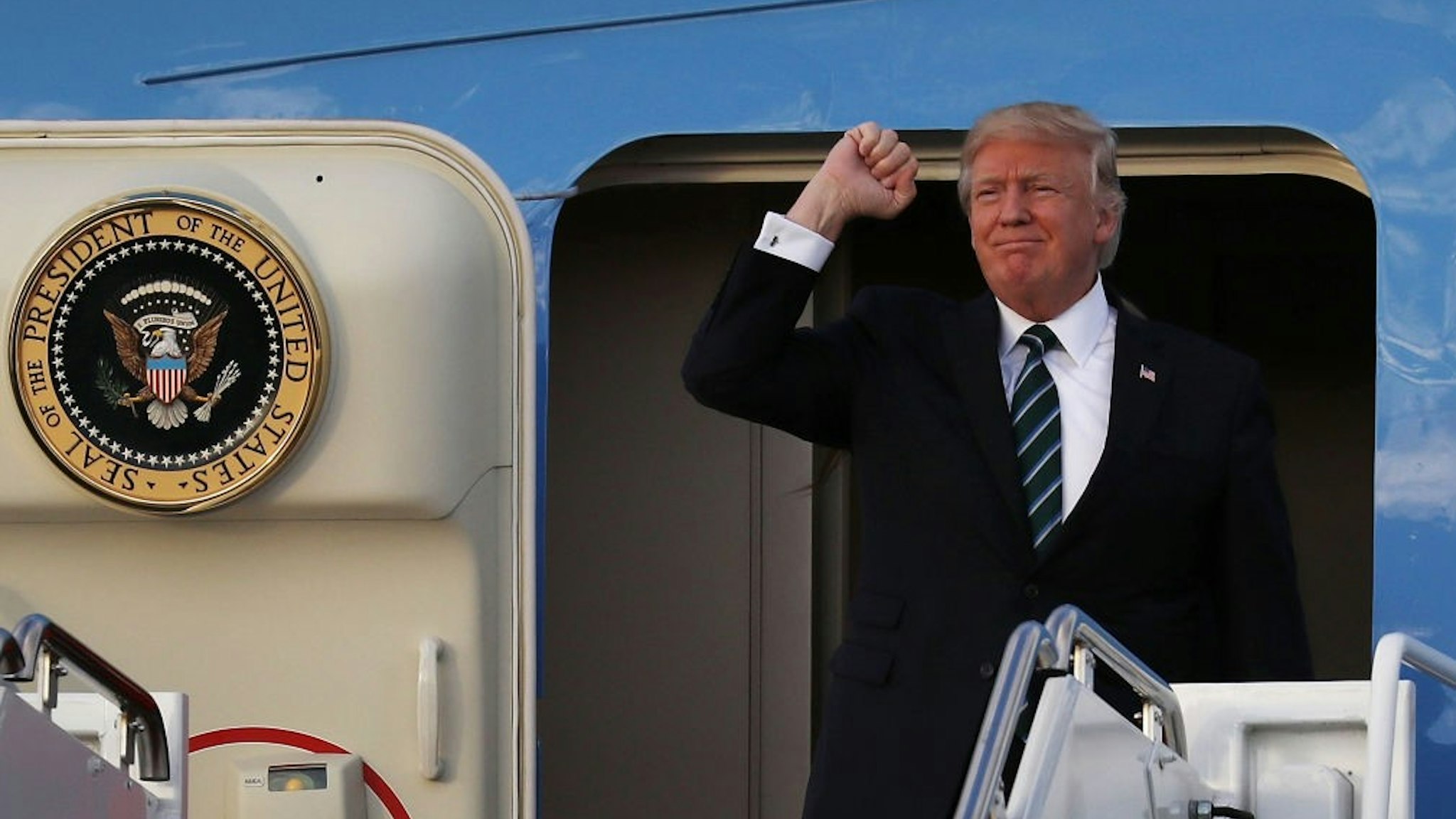 WEST PALM BEACH, FL - MARCH 17: U.S. President Donald Trump arrives on Air Force One at the Palm Beach International Airport to spend part of the weekend at Mar-a-Lago resort on March 17, 2017 in West Palm Beach, Florida. President Trump has made numerous trips to his Florida home since the inauguration. (Photo by
