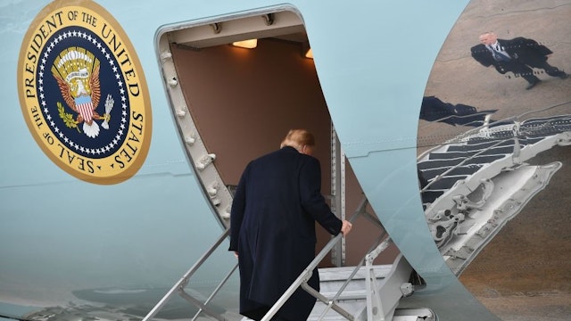 US President Donald Trump boards Air Force One before departing from Andrews Air Force Base in Maryland on January 14, 2019. - Trump is heading to New Orleans, Louisiana to address the annual American Farm Bureau Federation convention. (Photo by MANDEL NGAN / AFP) (Photo by