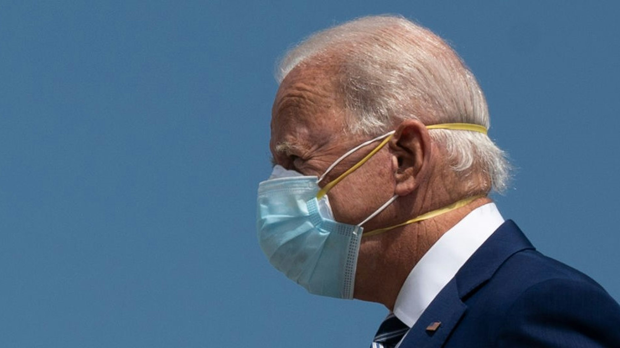 Democratic Presidential Candidate Joe Biden wears two masks as he arrives in Fort Lauderdale, Florida on October 13, 2020. - Joe Biden headed for Florida on Tuesday to court elderly Americans who helped elect Donald Trump four years ago but appear to be swinging to the Democratic candidate for the White House this time around amid the coronavirus pandemic. Biden, at 77 the oldest Democratic nominee ever, is to "deliver his vision for older Americans" at an event in the city of Pembroke Pines, north of Miami, his campaign said. (Photo by JIM WATSON / AFP) (Photo by