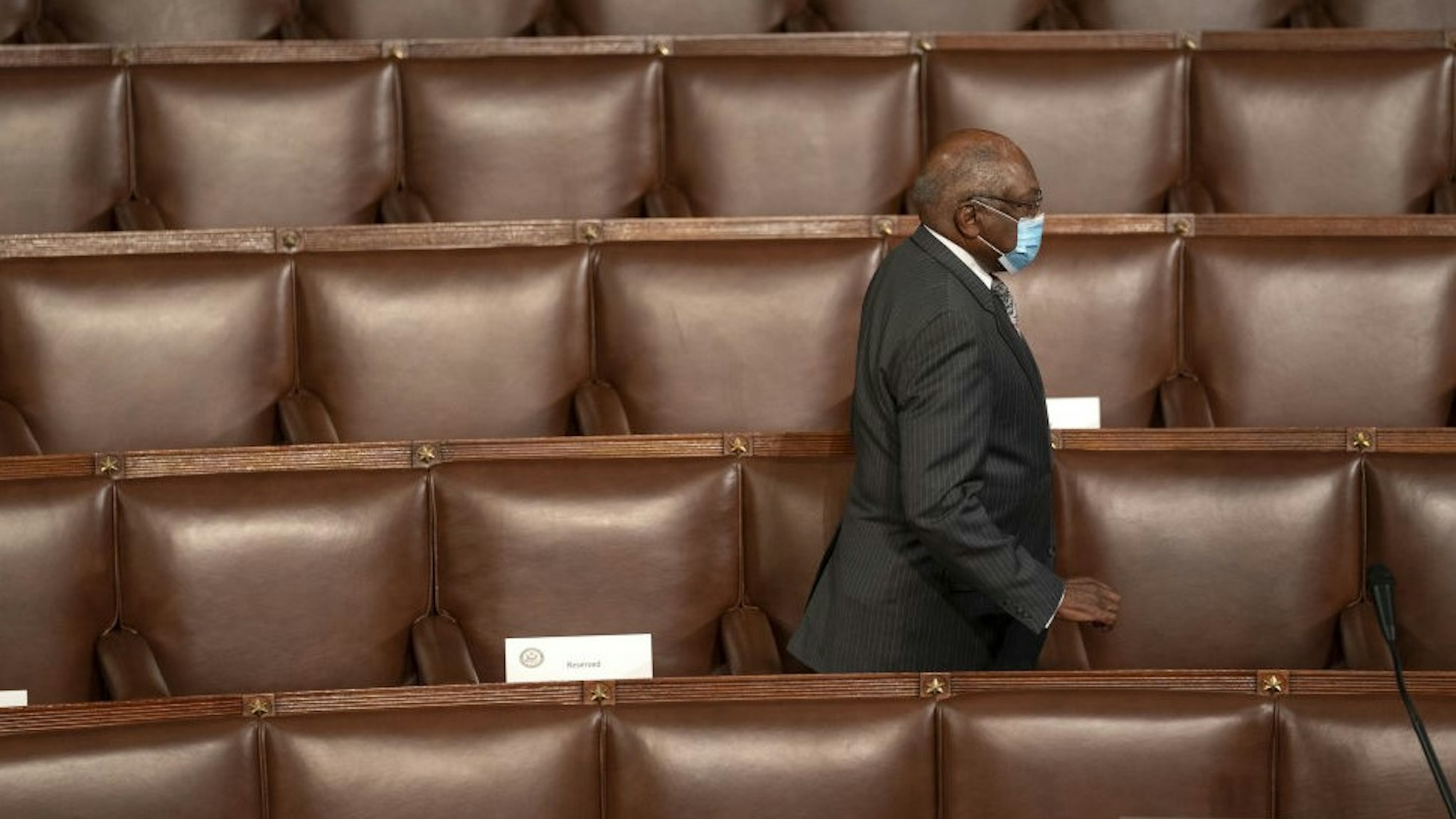 Representative James Clyburn, a Democrat from South Carolina, wears a protective mask while arriving to a joint session of Congress to count the Electoral College votes of the 2020 presidential election in the House Chamber in Washington, D.C., U.S., on Wednesday, Jan. 6, 2021. Congress is meeting to certify Joe Biden as the winner of the 2020 presidential election, with scores of Republican lawmakers preparing to challenge the tally in a number of states during what is normally a largely ceremonial event. Photographer: