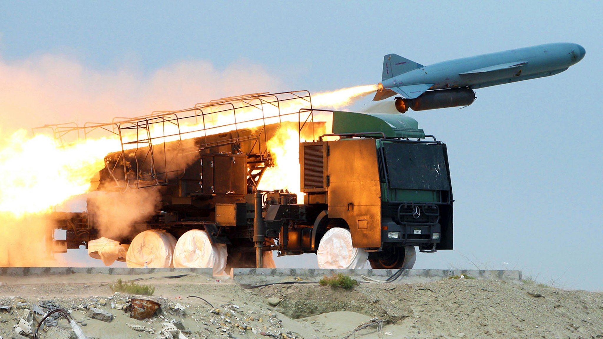 An Iranian Saeqeh missile is launched during war games on April 25, 2010 in southern Iran, near the Strait of Hormuz, the narrow strategically located waterway through which 40 percent of world's seaborne oil supplies pass. Iran's elite Revolutionary Guards fired five missiles as part of an ongoing three-day military drill, with Fars news agency naming two of those tested as the Noor (Light) and Nasr (Victory) missiles. It said a third, having a range of over 300 kilometres was also fired, but did not name it. The Islamic republic's missile programme has raised concerns in the West which is already at loggerheads with Tehran over its controversial nuclear project.