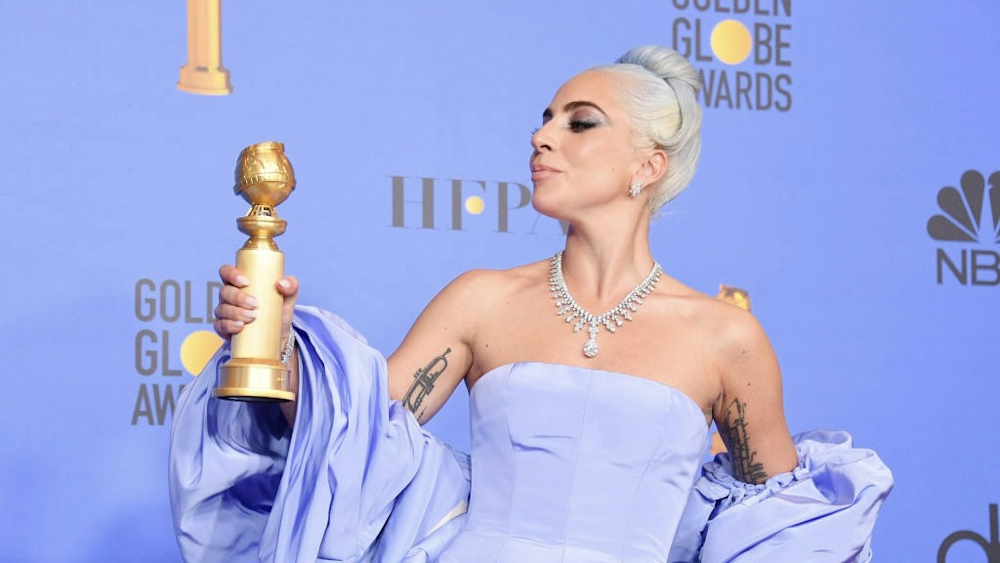 BEVERLY HILLS, CALIFORNIA - JANUARY 06: Winner for Best Original Song - Motion Picture for ‘Shallow - A Star is Born’ Lady Gaga poses with the trophy in the press room during the 76th Annual Golden Globe Awards at The Beverly Hilton Hotel on January 6, 2019 in Beverly Hills, California. (Photo by George Pimentel/WireImage)