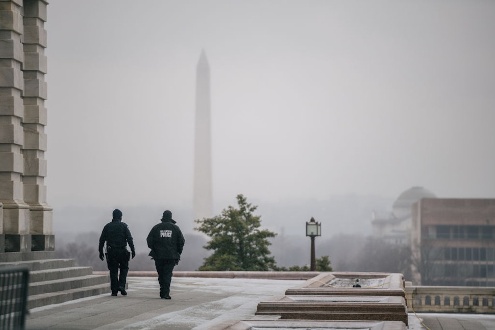 WASHINGTON, DC - FEBRUARY 13: Capitol Police officers patrol the U.S. Capitol grounds following the conclusion of the second impeachment trial of former President Donald Trump on February 13, 2021 in Washington, DC. The Senate voted 57-43 to acquit Trump.