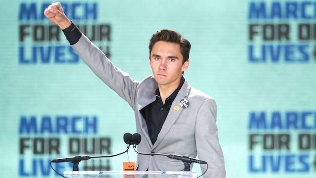 WASHINGTON, DC - MARCH 24: Marjory Stoneman Douglas High School Student David Hogg addresses the March for Our Lives rally on March 24, 2018 in Washington, DC. Hundreds of thousands of demonstrators, including students, teachers and parents gathered in Washington for the anti-gun violence rally organized by survivors of the Marjory Stoneman Douglas High School shooting on February 14 that left 17 dead. More than 800 related events are taking place around the world to call for legislative action to address school safety and gun violence.