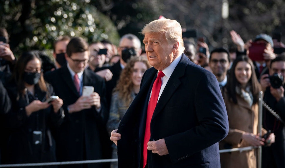 WASHINGTON, DC - JANUARY 12: U.S. President Donald Trump exits the White House to walk toward Marine One on the South Lawn on January 12, 2021 in Washington, DC. Following last week's deadly pro-Trump riot at the U.S. Capitol, President Trump is making his first public appearance with a trip to the town of Alamo, Texas to view the construction of the wall along the U.S.-Mexico border. (Photo by Drew Angerer/Getty Images)