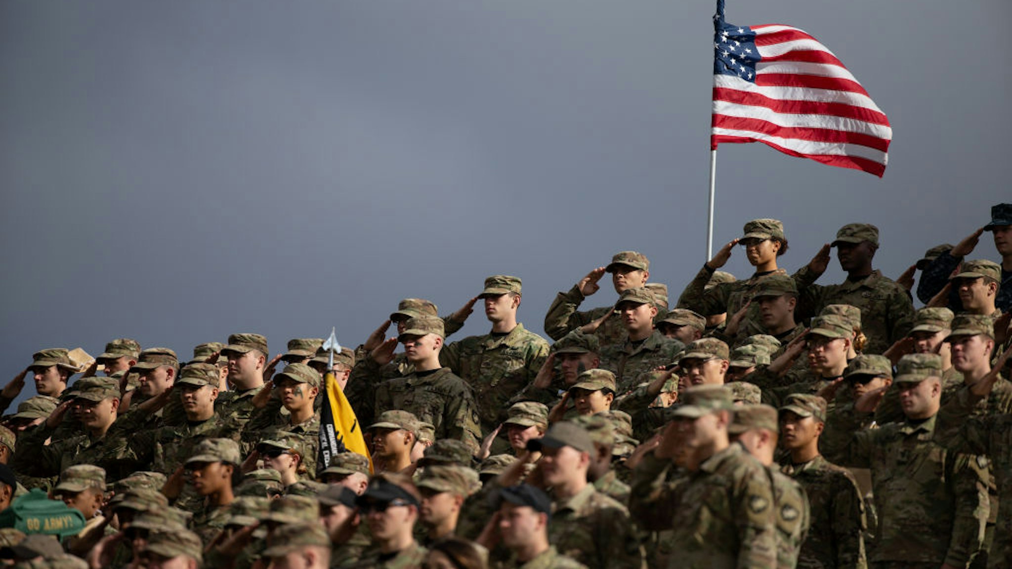 United States Military Academy cadets salute during the national anthem before the start of a game between the Army Black Knights and the Air Force Falcons at Michie Stadium on November 3, 2018 in West Point, New York.