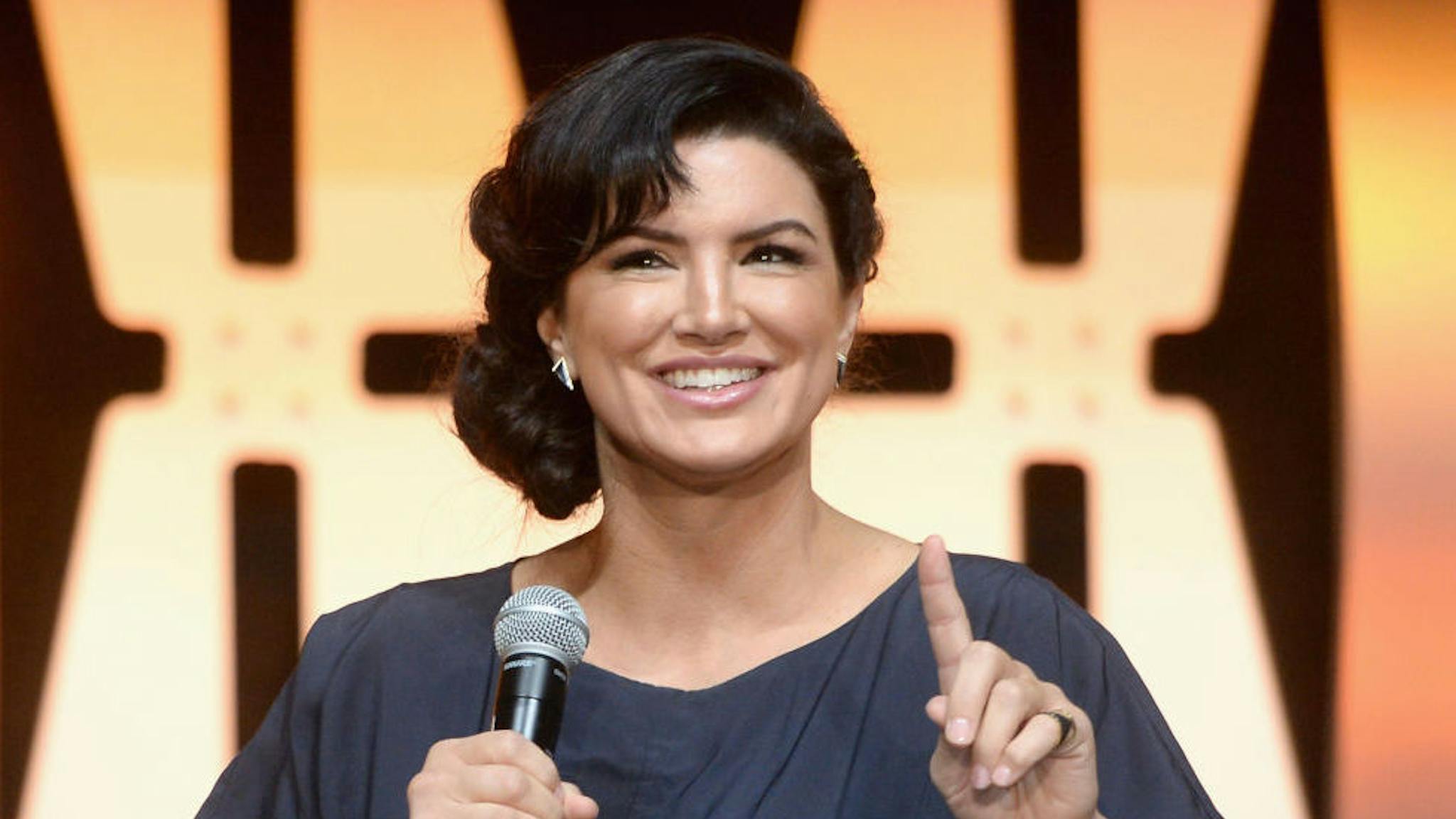 Star Wars Celebration: “The Mandalorian” Panel CHICAGO, IL - APRIL 14: Gina Carano (Cara Dune) onstage during "The Mandalorian" panel at the Star Wars Celebration at McCormick Place Convention Center on April 14, 2019 in Chicago, Illinois. (Photo by Daniel Boczarski/WireImage for Disney)