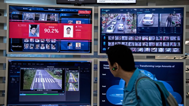 SHENZHEN, CHINA - APRIL 26: A display for facial recognition and artificial intelligence is seen on monitors at Huawei's Bantian campus on April 26, 2019 in Shenzhen, China. Huawei is Chinas most valuable technology brand, and sells more telecommunications equipment than any other company in the world, with annual revenue topping $100 billion U.S. Headquartered in the southern city of Shenzhen, considered Chinas Silicon Valley, Huawei has more than 180,000 employees worldwide, with nearly half of them engaged in research and development. In 2018, the company overtook Apple Inc. as the second largest manufacturer of smartphones in the world behind Samsung Electronics, a milestone that has made Huawei a source of national pride in China.