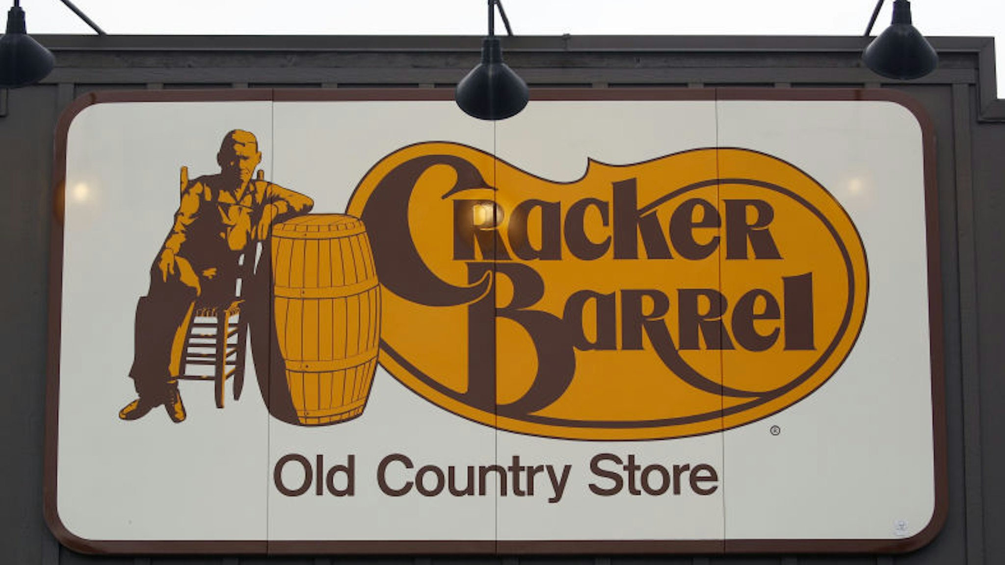 Signage is displayed outside a Cracker Barrel Old Country Store Inc. restaurant and gift shop in Louisville, Kentucky, U.S., on Monday, Sept. 23, 2019. Cracker Barrel is scheduled to release earnings figures on November 26. Photographer: Luke Sharrett/Bloomberg via Getty Images