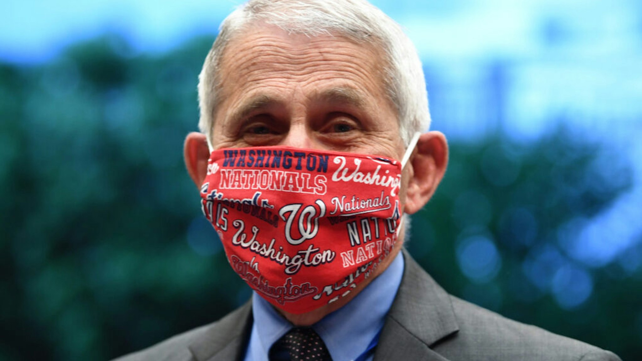 Director of the National Institute for Allergy and Infectious Diseases Dr. Anthony Fauci is see with a Washington Nationals face mask when he arrives to testify during the US Senate Health, Education, Labor, and Pensions Committee hearing to examine COVID-19, 'focusing on lessons learned to prepare for the next pandemic', on Capitol Hill in Washington, DC on June 23, 2020.