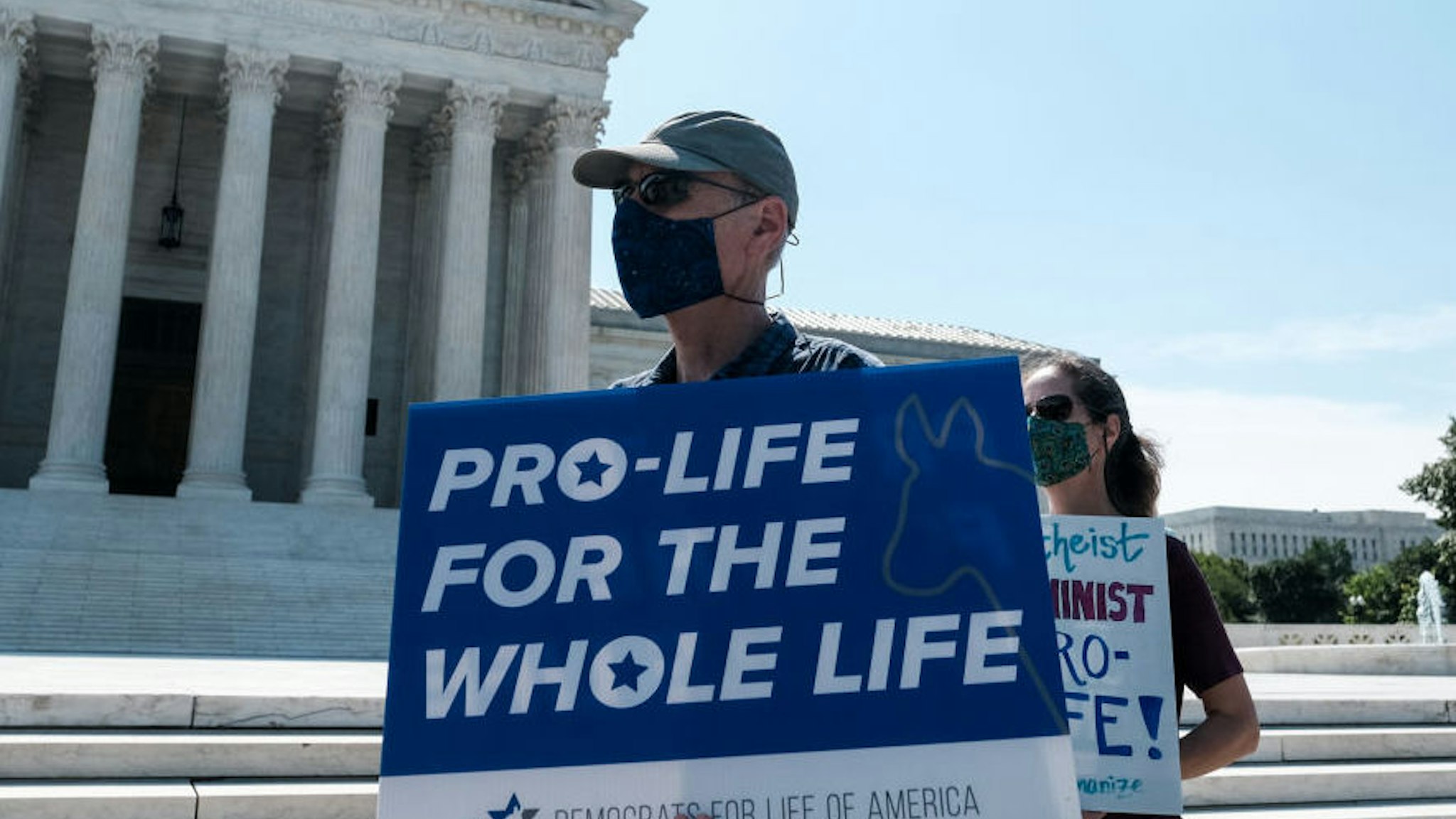 WASHINGTON, DC - JUNE 25: Pro-life activists stage a protest in front of the U.S. Supreme Court June 25, 2020 in Washington, DC. The Supreme Court is expected to issue a ruling on abortion rights soon. (Photo by Michael A. McCoy/Getty Images)