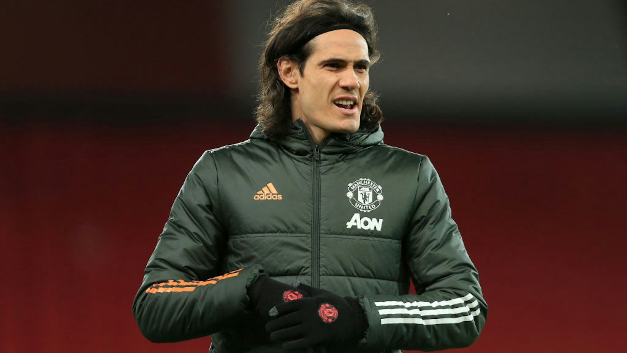 Edinson Cavani of Manchester United looks on before The Emirates FA Cup Fifth Round match between Manchester United and West Ham United at Old Trafford on February 9, 2021 in Manchester, England.