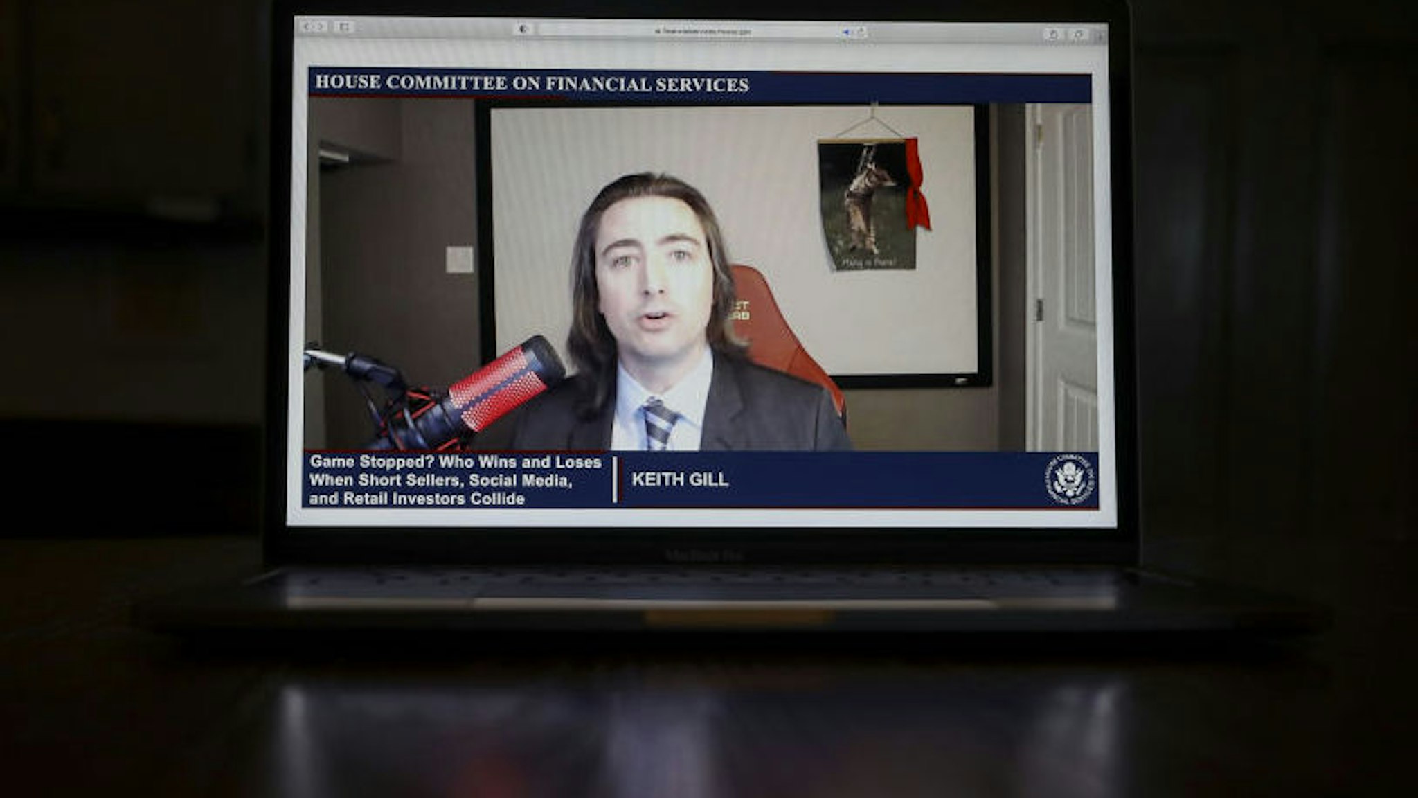 Keith Gill, a Reddit user credited with inspiring GameStop's rally, speaks virtually during a House Financial Services Committee hearing on a laptop computer in Tiskilwa, Illinois, U.S., on Thursday, Feb. 18, 2021.