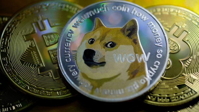 KATWIJK, NETHERLANDS - JANUARY 29: In this photo illustration, visual representations of digital cryptocurrencies, Dogecoin and Bitcoin are arranged on January 29, 2021 in Katwijk, Netherlands.