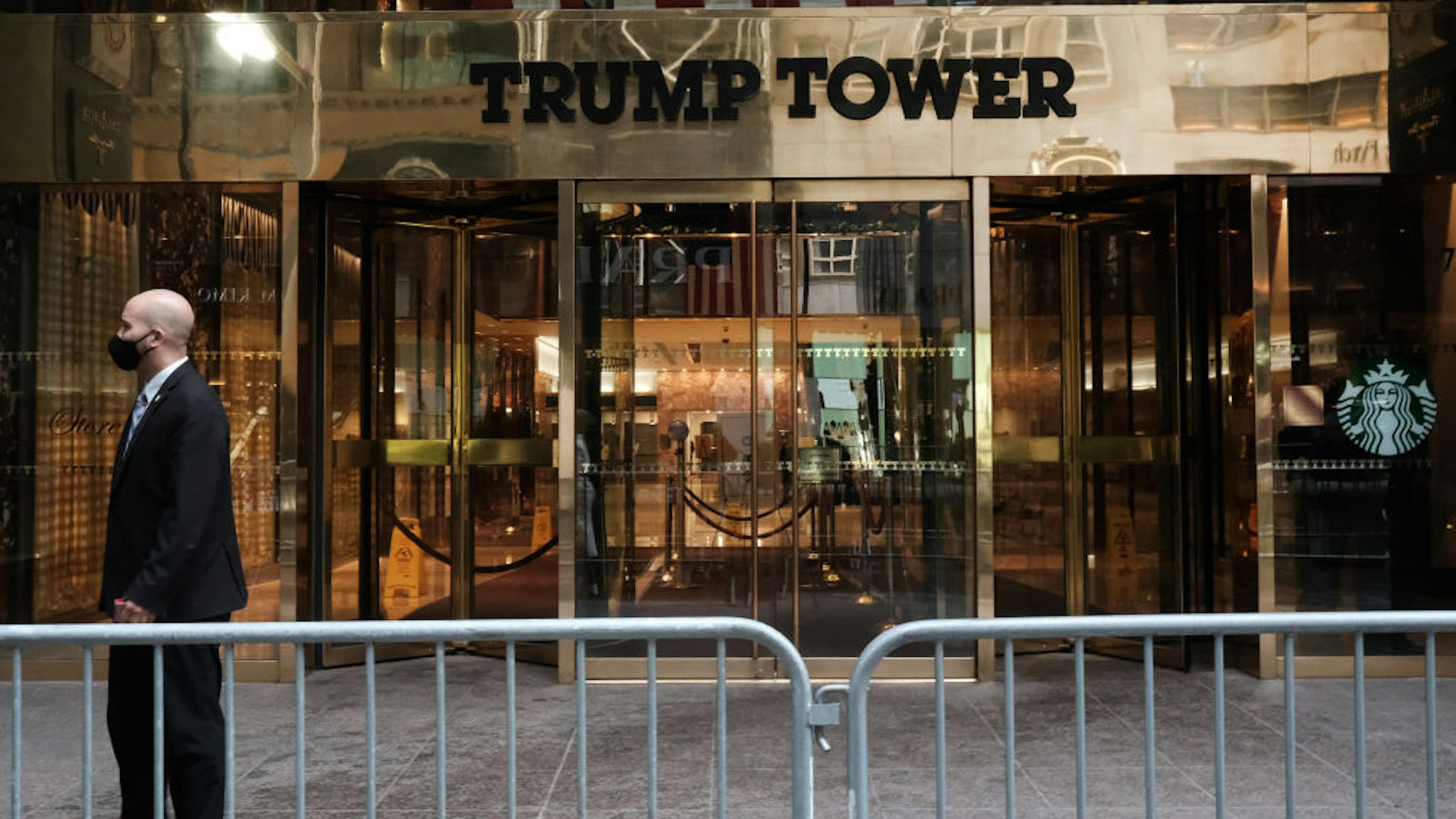 People walk past the Trump Tower as the impeachment trial of Donald Trump begins in Washington on February 09, 2021 in New York City.