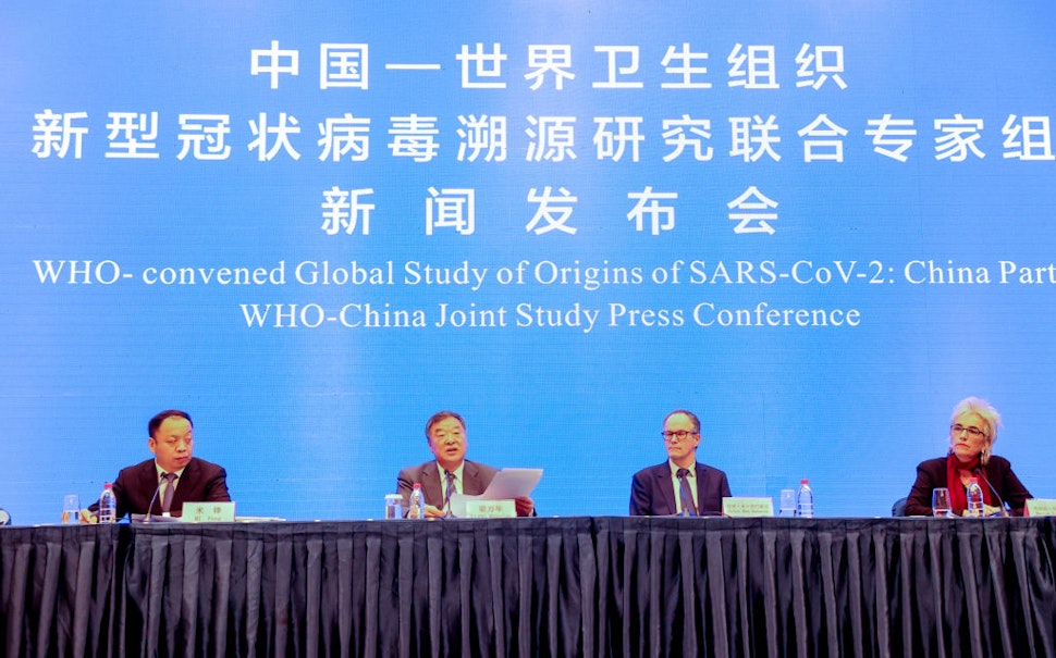 Experts from the WHO-China joint team Mi Feng, Liang Wannian, Peter Ben Embarek and Marion Koopmans attend the WHO-China Joint Study Press Conference on February 9, 2021 in Wuhan, Hubei Province of China.