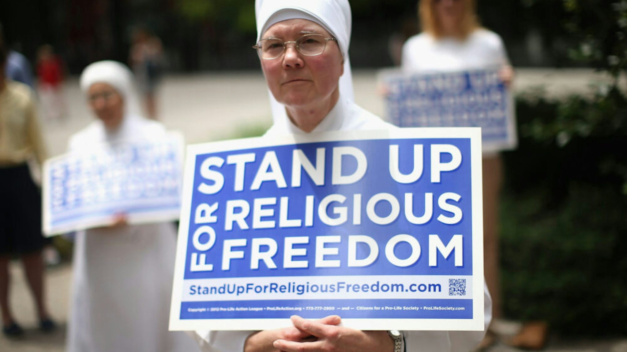 CHICAGO, IL - JUNE 30: Sister Caroline attends a rally with other supporters of religious freedom to praise the Supreme Court's decision in the Hobby Lobby, contraception coverage requirement case on June 30, 2014 in Chicago, Illinois. Oklahoma-based Hobby Lobby, which operates a chain of arts-and-craft stores, challenged the provision and the high court ruled 5-4 that requiring family-owned corporations to pay for insurance coverage for contraception under the Affordable Care Act violated a federal law protecting religious freedom.