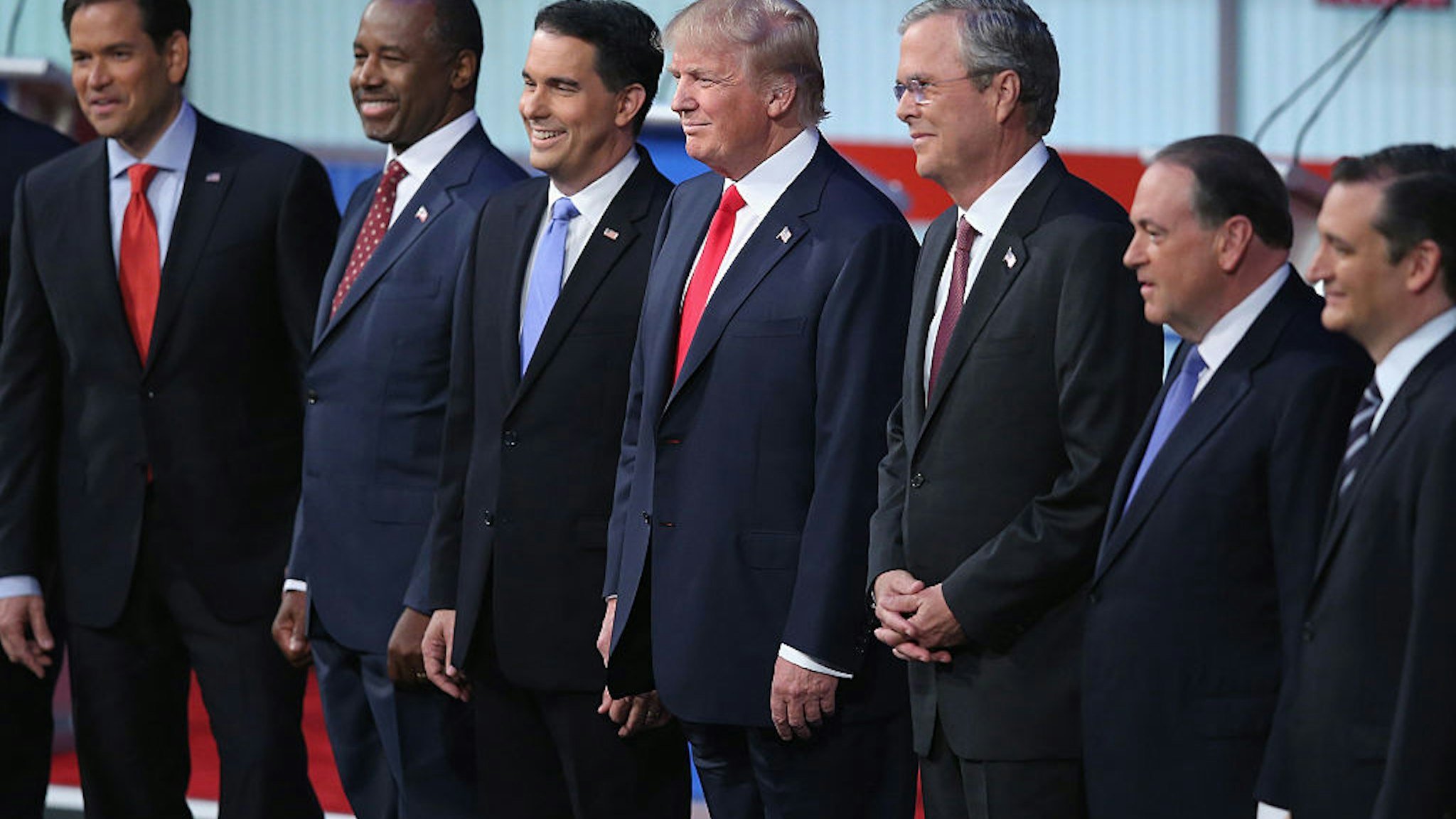 CLEVELAND, OH - AUGUST 06: Republican presidential candidates (L-R) Sen. Marco Rubio (R-FL), Ben Carson, Wisconsin Gov. Scott Walker, Donald Trump, Jeb Bush, Mike Huckabee and Sen. Ted Cruz (R-TX) take the stage for the first prime-time presidential debate hosted by FOX News and Facebook at the Quicken Loans Arena.