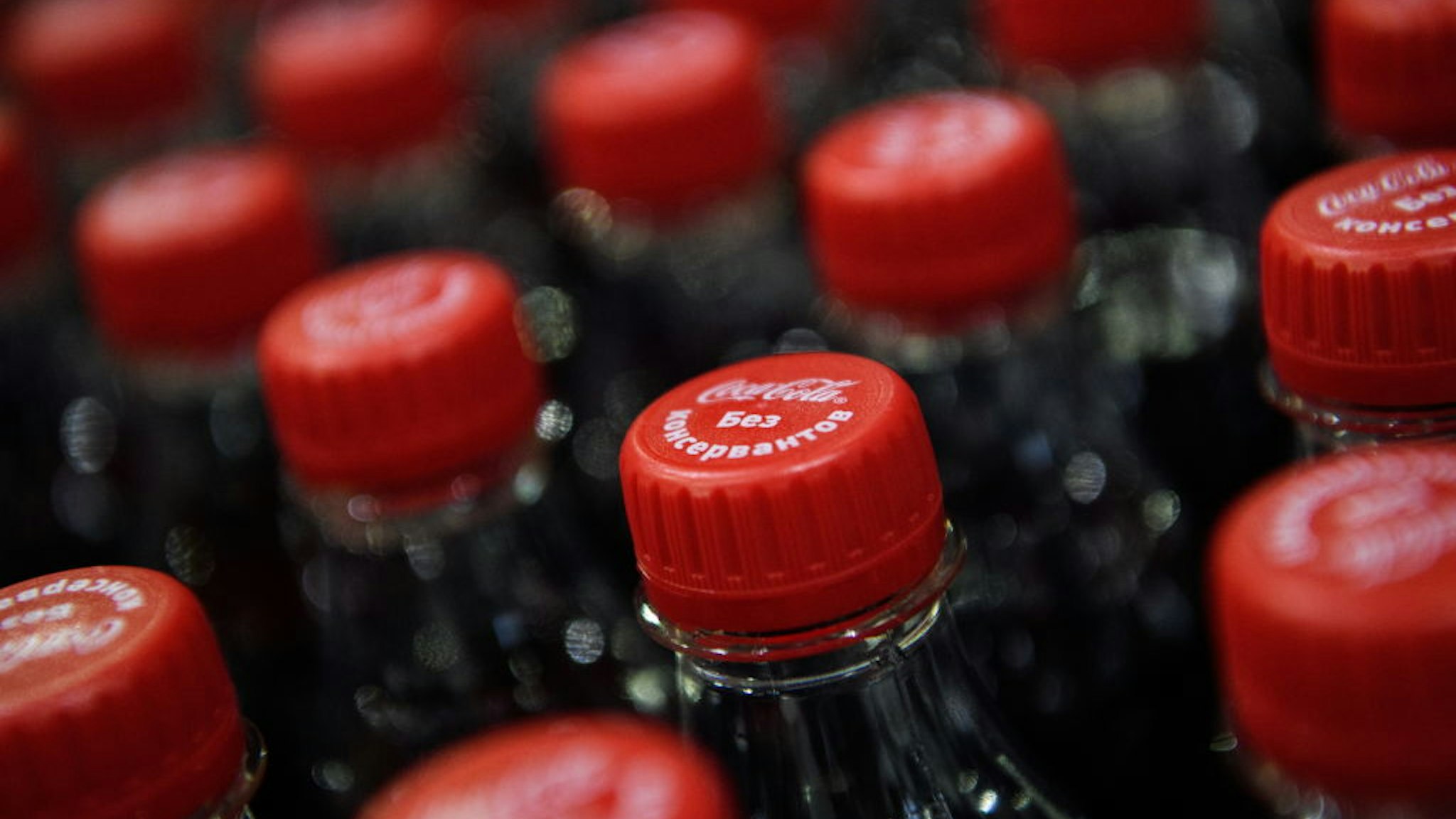 YEKATERINBURG, RUSSIA - APRIL 6, 2017: Coca-Cola bottles on the production line at the Coca-Cola HBC Russia plant in Yekaterinburg. Donat Sorokin/TASS (Photo by Donat SorokinTASS via Getty Images)