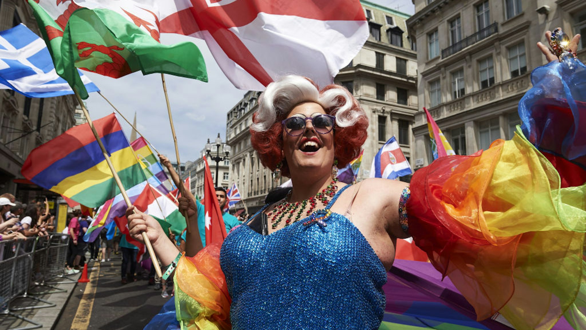 Members of the Lesbian, Gay, Bisexual and Transgender (LGBT) community take part in the annual Pride Parade in London on July 8, 2017. / AFP PHOTO / NIKLAS HALLE'N (Photo credit should read NIKLAS HALLE'N/AFP via Getty Images)