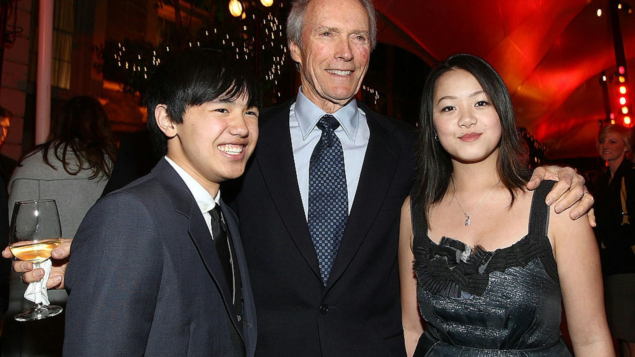 BURBANK, CA - DECEMBER 09: Actor Bee Vang, director Clint Eastwood and actress Ahney Her attend the after party for the world premiere of Warner Bros. Pictures' "Gran Torino" held at Warner Bros. Studios on December 9, 2008 in Burbank, California. (Photo by Alberto E. Rodriguez/Getty Images)
