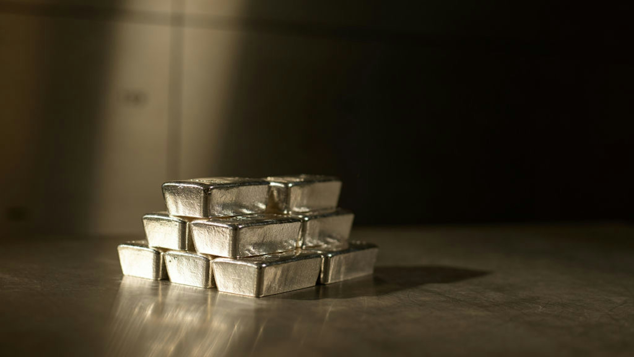 stack of 500 gram silver bars sit in the precious metals vault at Pro Aurum KG in Munich, Germany, on Tuesday, Jan. 30, 2018. Gold, trading near an 18-month high, will average $1,318 an ounce this year, a little below the current price, according to an annual London Bullion Market Association poll. Photographer: Dominik Osswald/Bloomberg via Getty Images