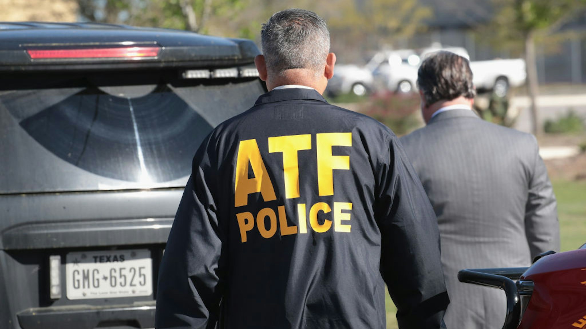 SCHERTZ, TX - MARCH 20: ATF agents continue their investigation at a FedEx facility following an explosion on March 20, 2018 in Schertz, Texas. A package exploded while being transported on a conveyor shortly after midnight this morning causing minor injuries to one person. The explosion is believed to be related to several recent package bombs that have been detonated in Austin, Texas, about an hour's drive from Schertz. (Photo by Scott Olson/Getty Images)