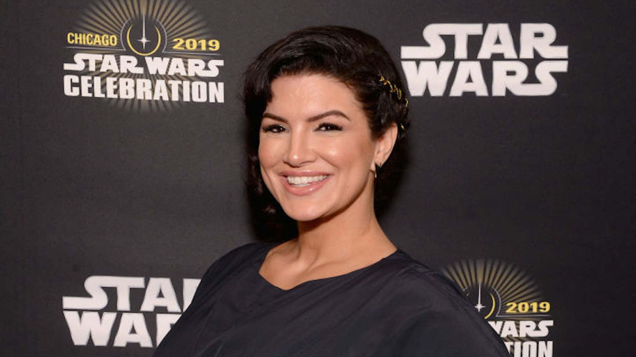 CHICAGO, IL - APRIL 14: Gina Carano (Cara Dune) attends "The Mandalorian" panel at the Star Wars Celebration at McCormick Place Convention Center on April 14, 2019 in Chicago, Illinois. (Photo by Daniel Boczarski/WireImage for Disney)
