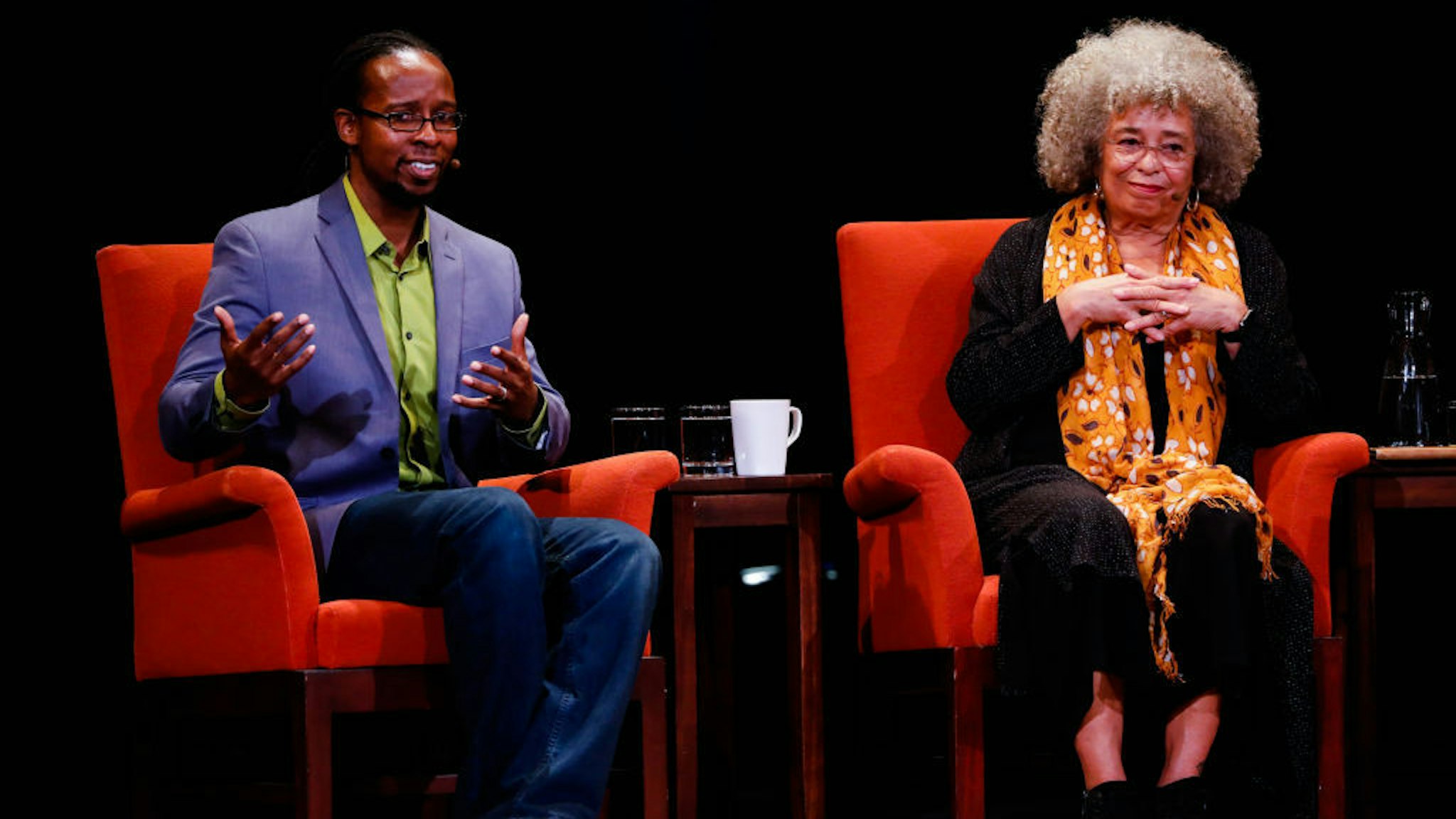 Activist Angela Davis (center) listens during a discussion panel with historian Ibram X. Kendi (left) at City Arts & Lectures in San Francisco, California, on Thursday, Jan. 10, 2019. (Photo by Gabrielle Lurie/San Francisco Chronicle via Getty Images)