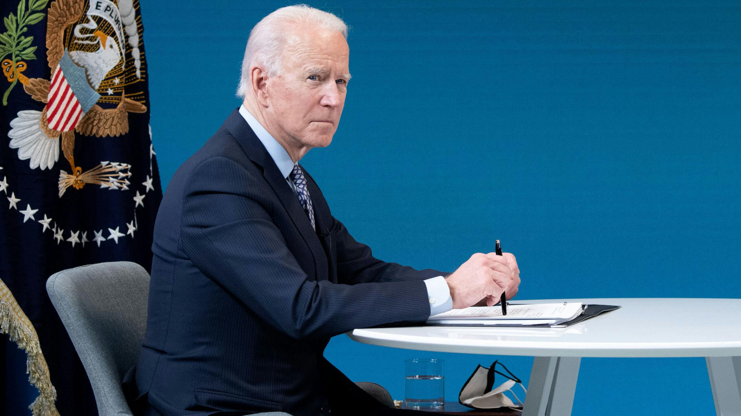 US President Joe Biden speaks during a virtual National Governors Association's Winter Meeting in the Eisenhower Executive Office Building in Washington, DC, February 25, 2021.