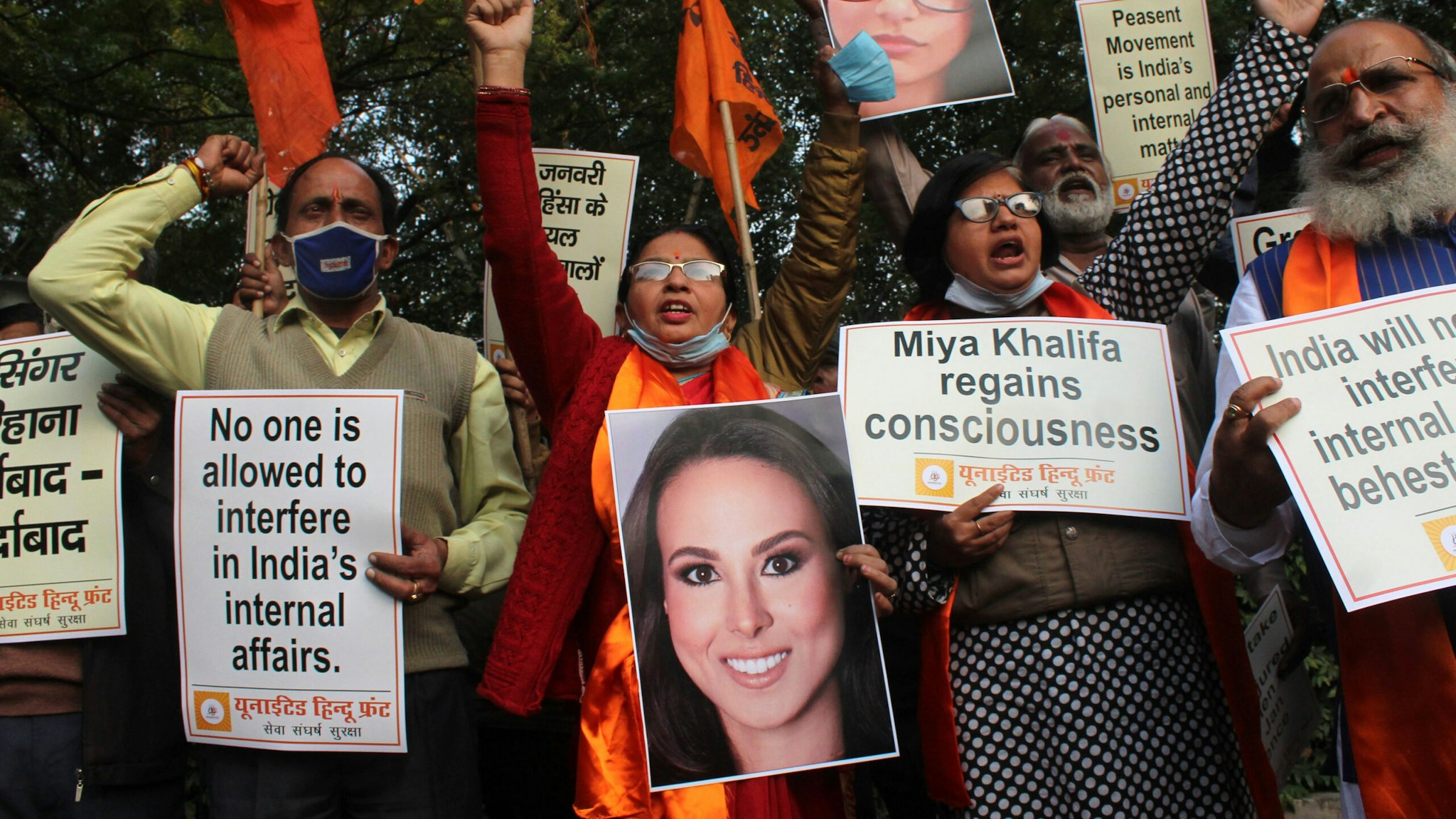 Members from United Hindu Front hold placards and shout slogans during a demonstration, to protest against Swedish climate activist Greta Thunberg, Barbadian singer Rihanna and American lawyer Meena Harris for commenting in support of protesting farmers, at Jantar Mantar in New Delhi, India on February 4, 2021.