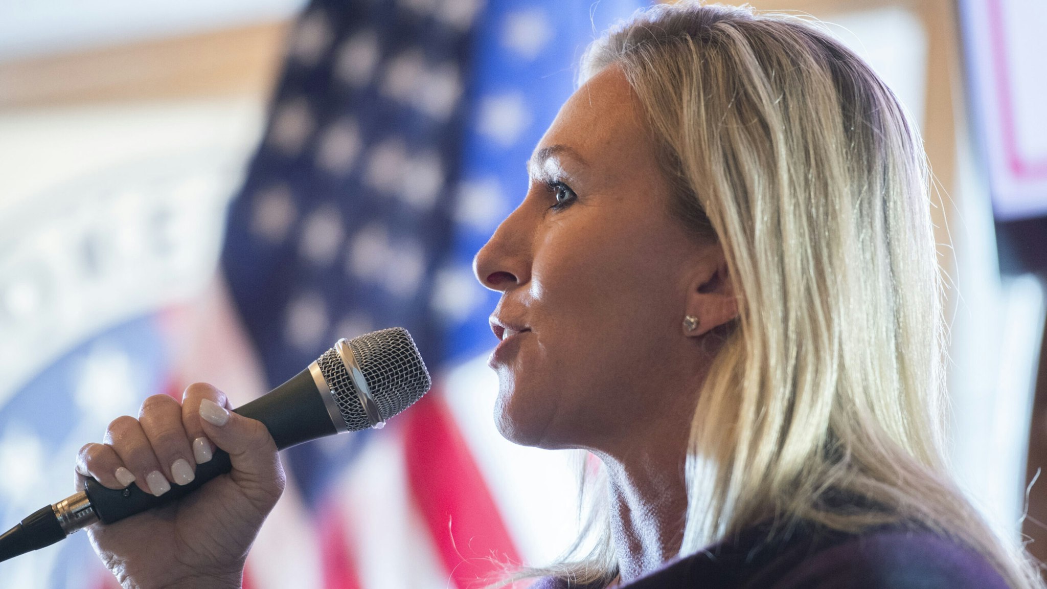 UNITED STATES - OCTOBER 31: Marjorie Taylor Greene, Republican nominee for Georgia's 14th Congressional District, speaks during a campaign event with Sen. Kelly Loeffler, R-Ga., who is running for reelection, at J.D.s on the Lake in Canton, Ga., on Saturday, October 31, 2020.