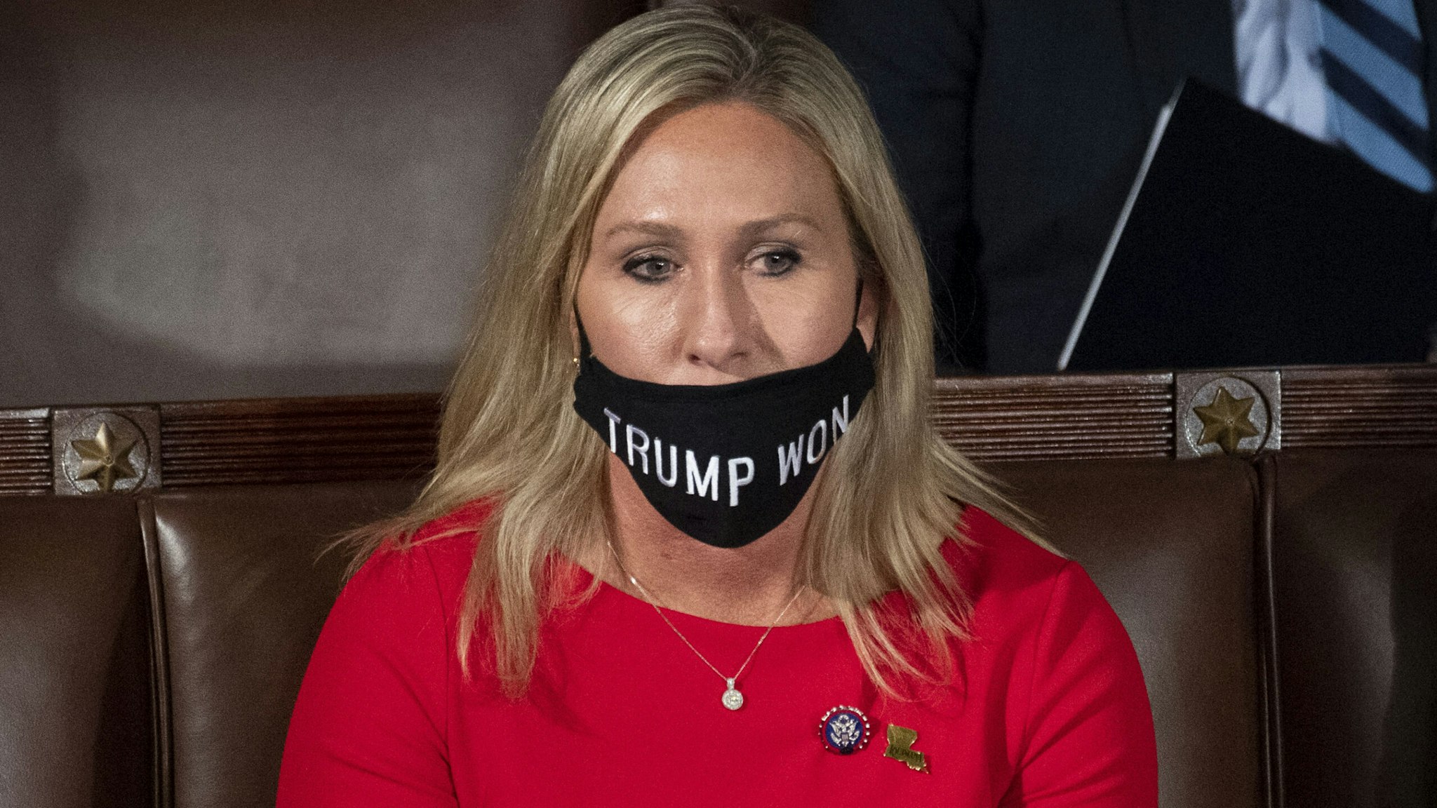 UNITED STATES - January 3: Rep.-elect Marjorie Taylor Greene, R-Ga., wears a Trump Won mask during the first session of the 117th Congress in the House Chamber as members of the 117th Congress are sworn in on Sunday, Jan. 3, 2021