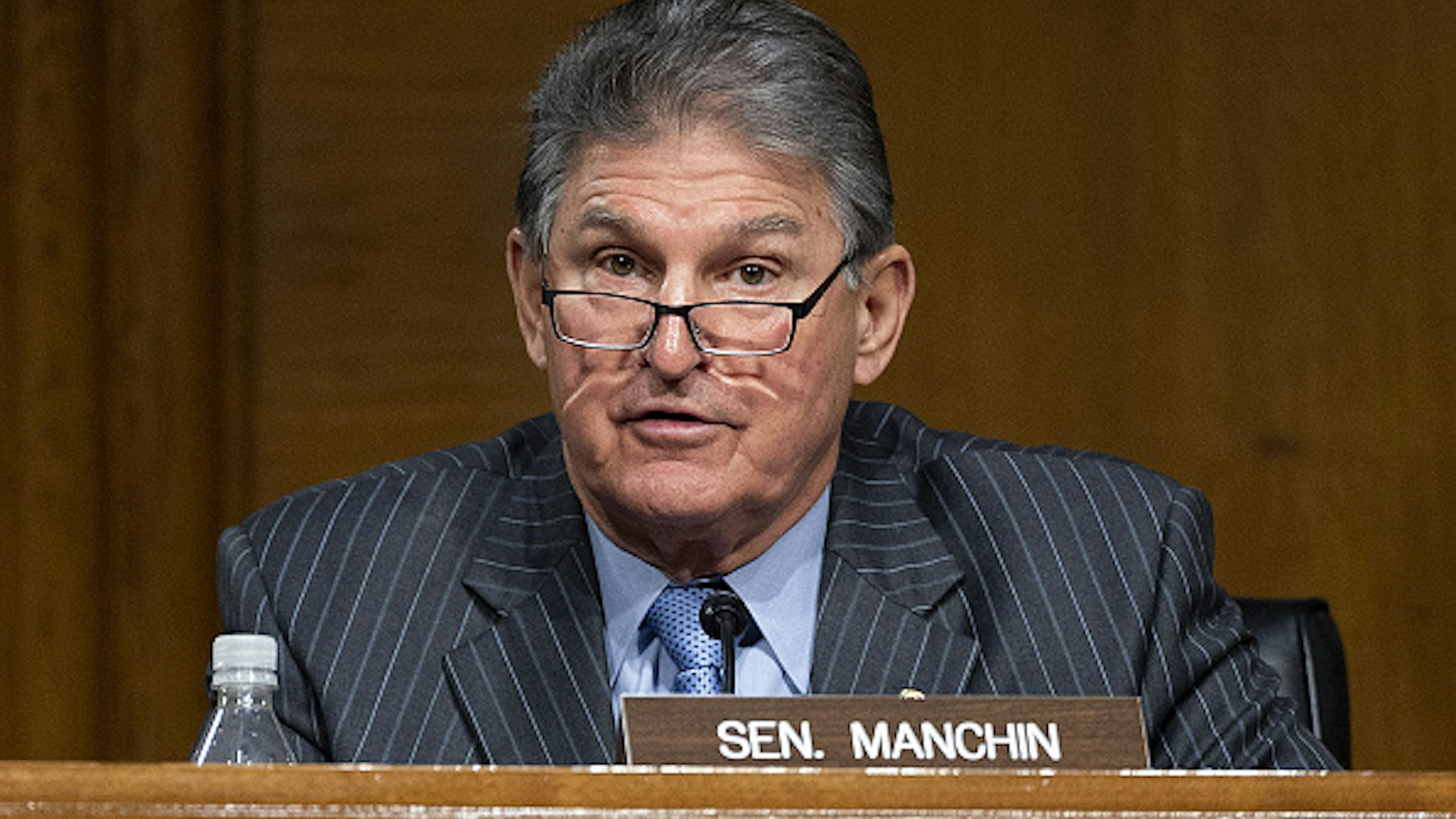 Senator Joe Manchin, a Democrat from West Virginia and ranking member of the Senate Energy and Natural Resources Committee, speaks during confirmation hearing for Jennifer Granholm, U.S. secretary of energy nominee for U.S. President Joe Biden, in Washington, D.C., U.S., on Wednesday, Jan. 27, 2021. Granholm, the former governor of the politically pivotal state of Michigan, if confirmed will lead the Department of Energy which is expected to play an enlarged role in the battle against climate change.