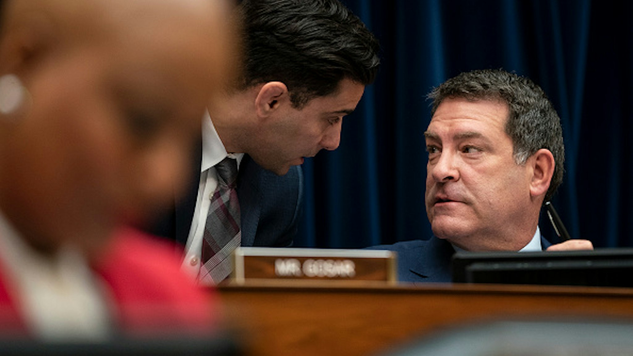 WASHINGTON, DC - MARCH 11: U.S. Rep. Mark Green (R-TN) confers with an aide during a House Oversight And Reform Committee hearing concerning government preparedness and response to the coronavirus, in the Rayburn House Office Building on Capitol Hill March 11, 2020 in Washington, DC. Since December 2019, coronavirus (COVID-19) has infected more than 109,000 people and killed more than 3,800 people in 105 countries.