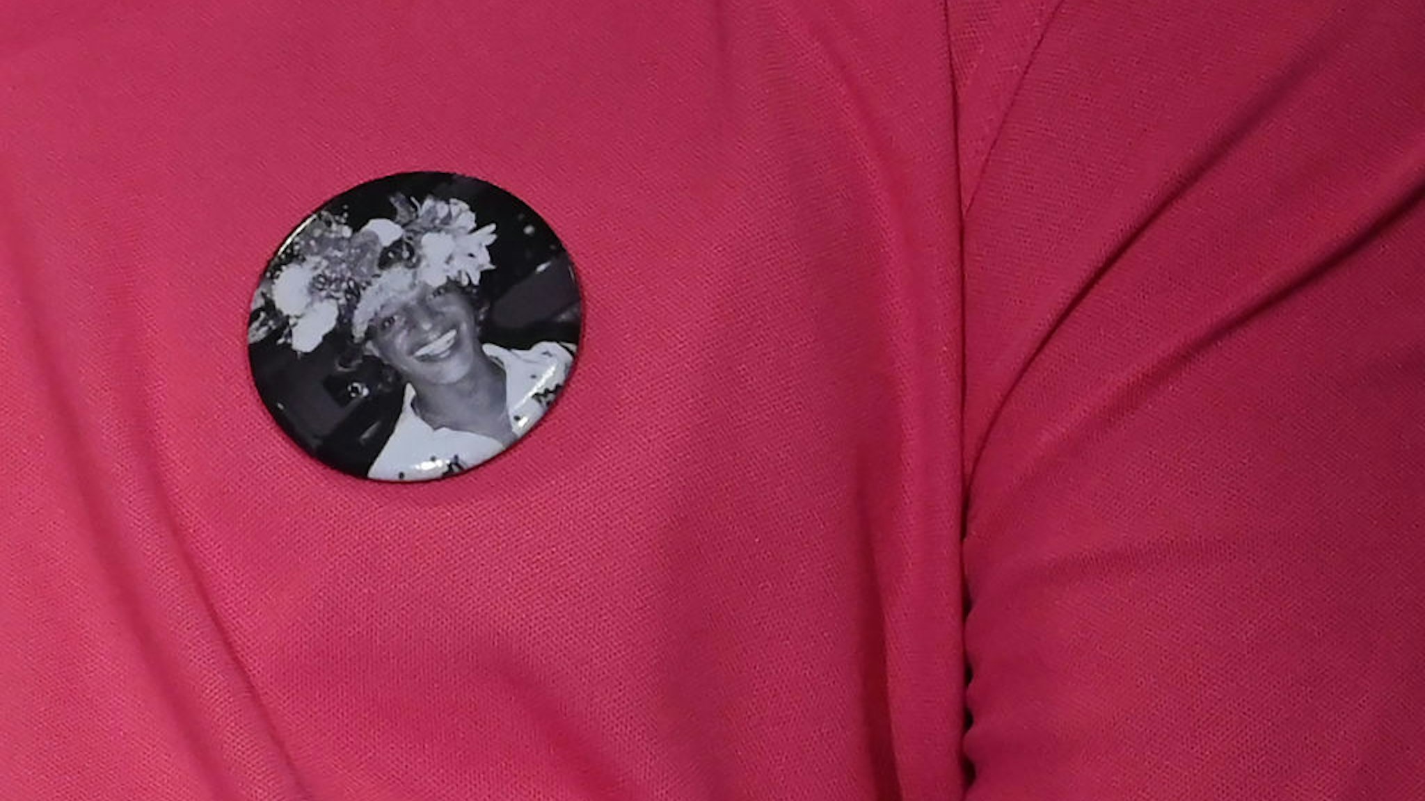 A man wears a button with a picture of transgender activist Marsha P. Johnson during an event at the The Lesbian, Gay, Bisexual &amp; Transgender Community Center in New York on May 30, 2019. - Mayor Bill de Blasio announced the next She Built NYC monument that will honor pioneering transgender activists Marsha P. Johnson and Sylvia Rivera, key leaders in the Stonewall Uprising that sparked the gay liberation movement and the modern fight for LGBTQ rights in the US.