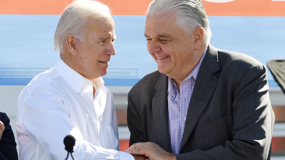 Former Vice President Joe Biden Campaigns For Nevada Democrats In Las Vegas LAS VEGAS, NEVADA - OCTOBER 20: Former U.S. Vice President Joe Biden (L) greets Clark County Commission Chairman and Democratic gubernatorial candidate Steve Sisolak during a rally at the Culinary Workers Union Hall Local 226 as Biden campaigns for Nevada Democratic candidates on October 20, 2018 in Las Vegas, Nevada. Early voting for the midterm elections in Nevada begins today.