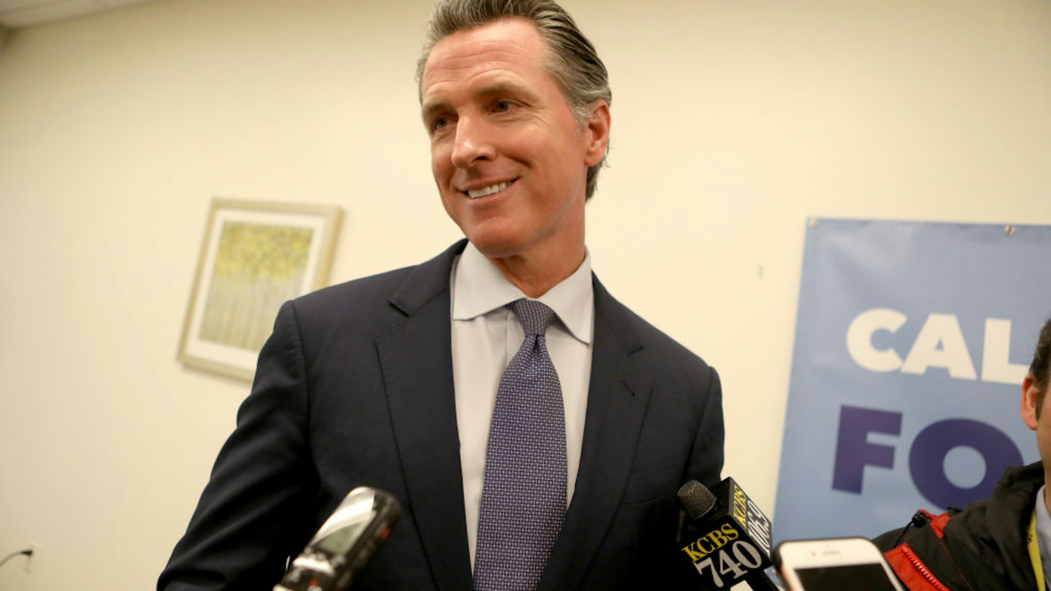 SAN JOSE, CA - JANUARY 15: Governor Gavin Newsom talks with news reporters following a roundtable with local community members grappling with the state"u2019s housing crisis at the Seven Trees Community Center in San Jose, Calif., on Tuesday, Jan. 15, 2019. The Governor spoke about the first-in-the-nation housing affordability proposals he laid out in the budget submitted to the Legislature last week.