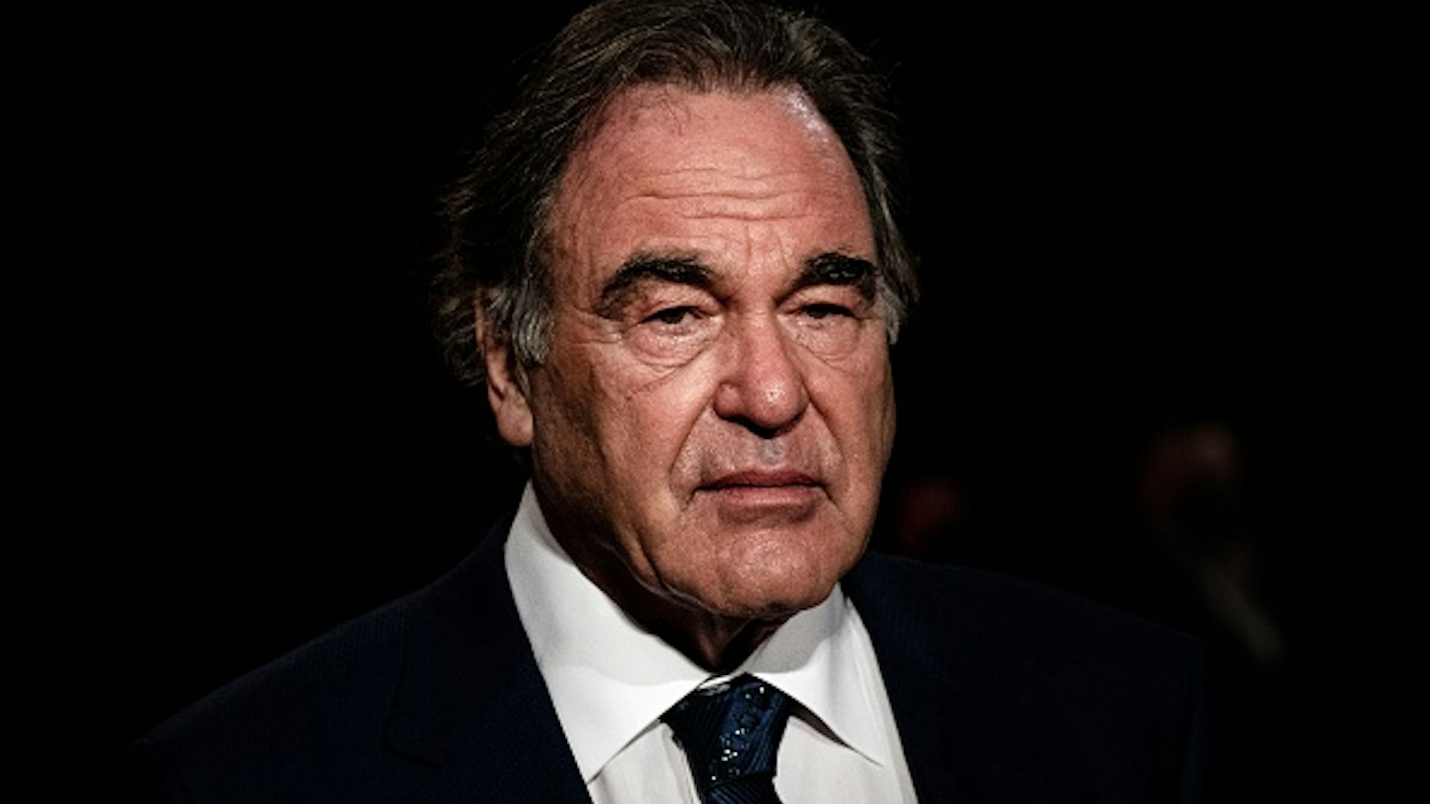 US film director Oliver Stone arrives for the opening ceremony of the 12th edition of the Lumiere Film Festival in Lyon, central eastern France, on October 10, 2020.