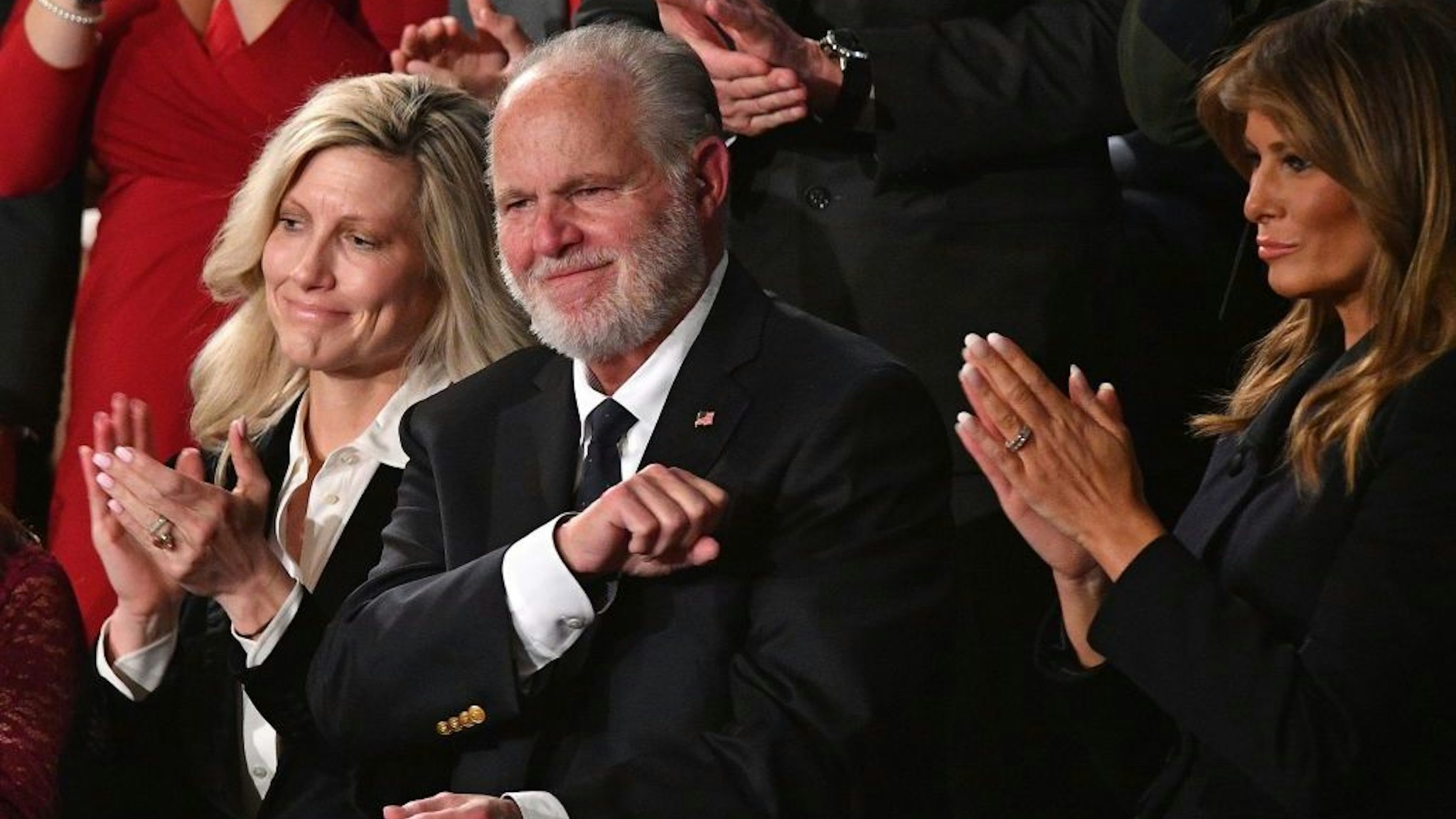 Radio personality Rush Limbaugh pumps his fist as he is acknowledged by US President Donald Trump as he delivers the State of the Union address at the US Capitol in Washington, DC, on February 4, 2020. (Photo by MANDEL NGAN / AFP) (Photo by MANDEL NGAN/AFP via Getty Images)
